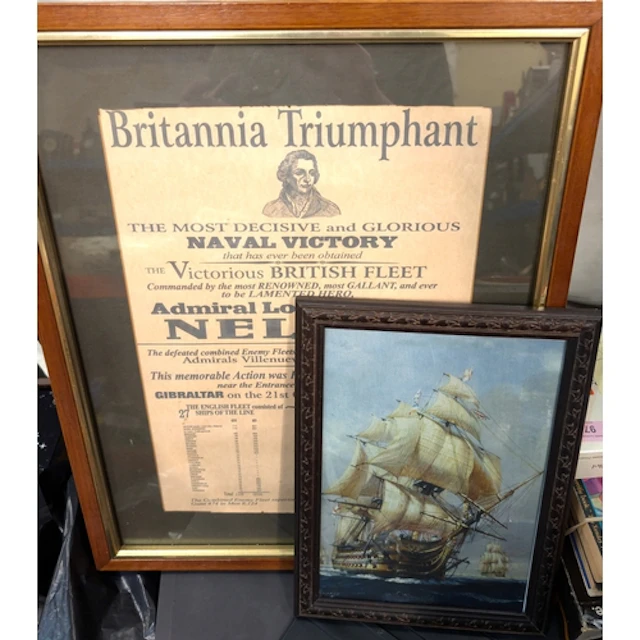 A cased diorama on golf clock, Nelson framed poster, two Afr...