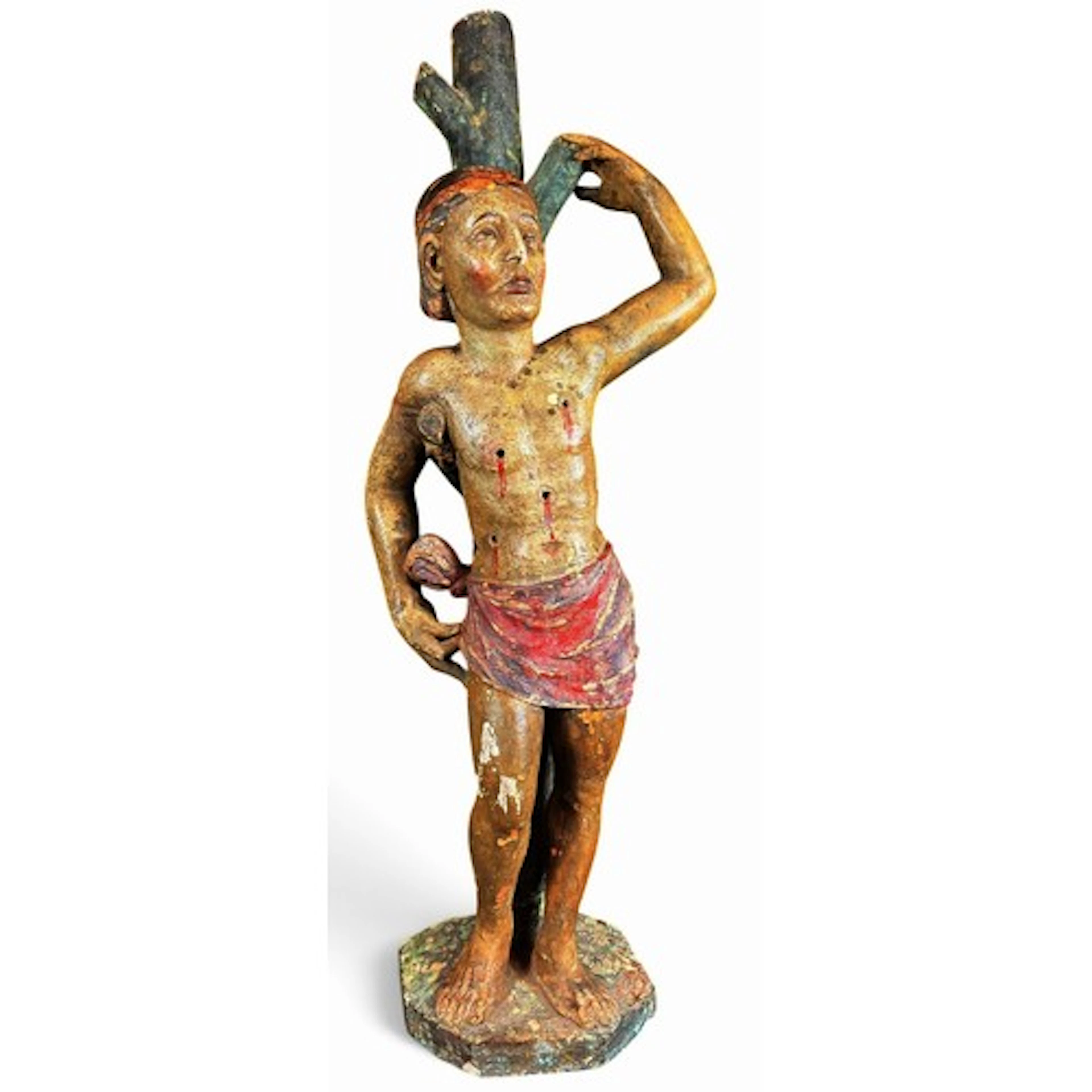 A polychrome painted terracotta figure depicting the martyrd...