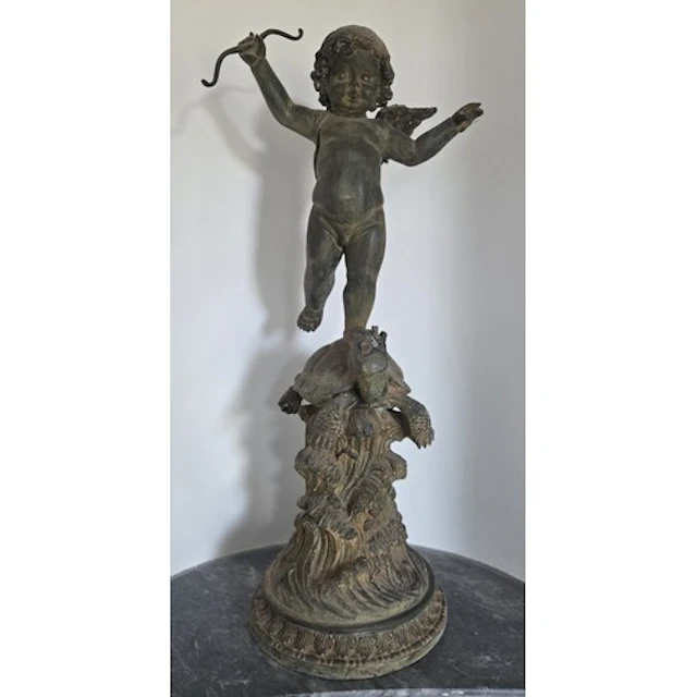 A pair of Cast Metal Cherubs standing on Tortoises. H 88 cm ...