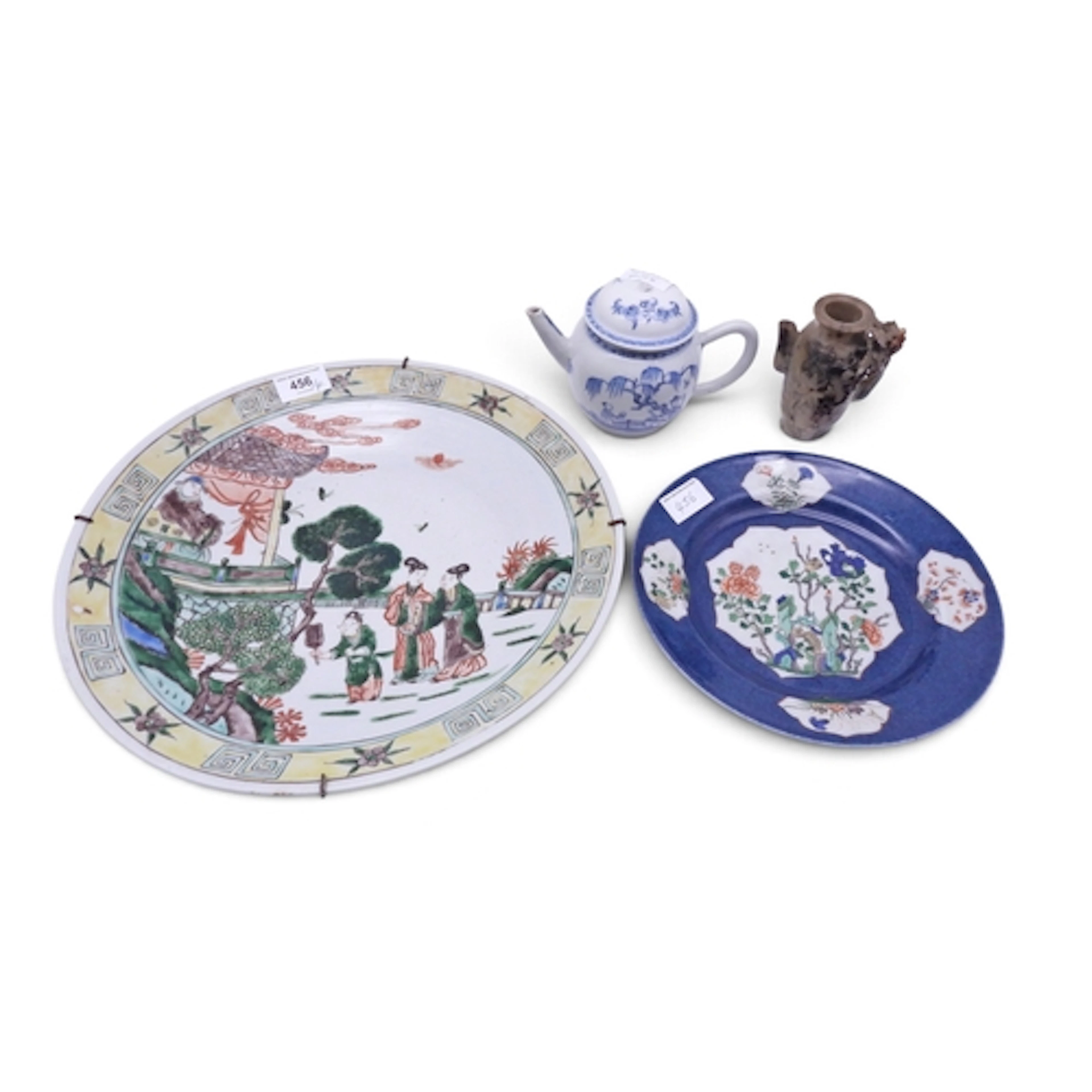 A Japanese plaque Painted with figures in a garden,34cm dia...