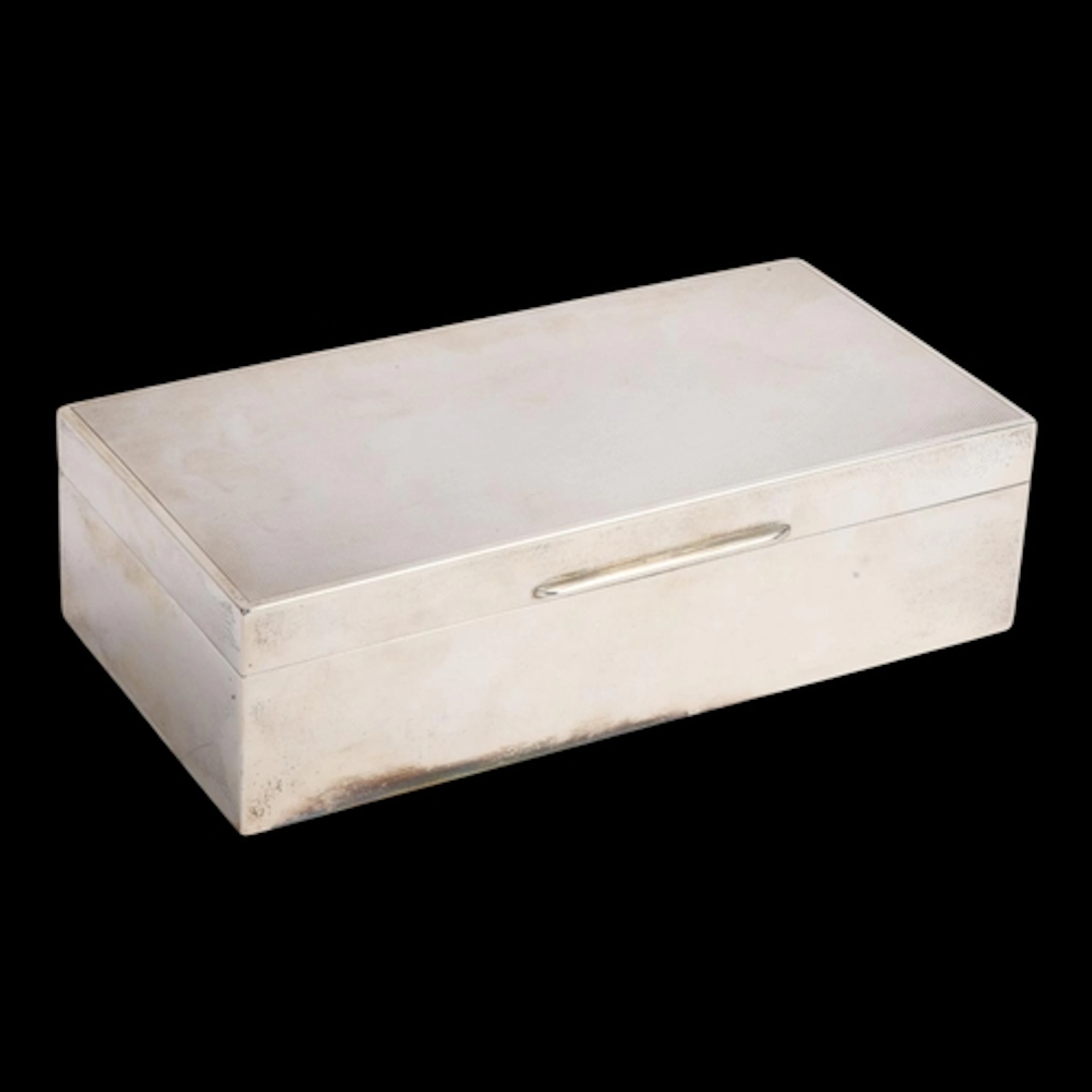 ASPREY - an Art Deco George V silver cigarette box, Asprey &...