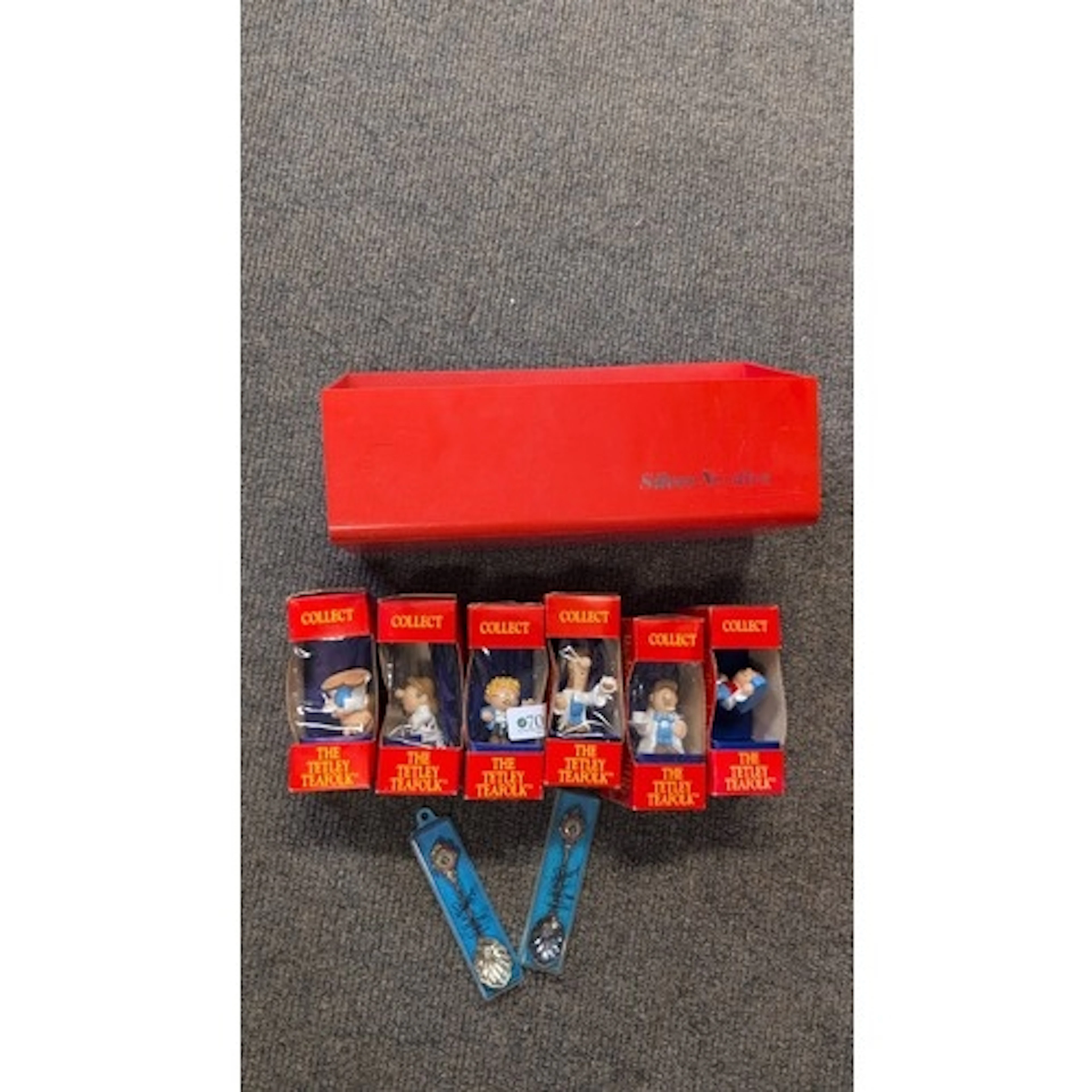 A collection of boxed Tetley Tea Folk promotional figures, t...