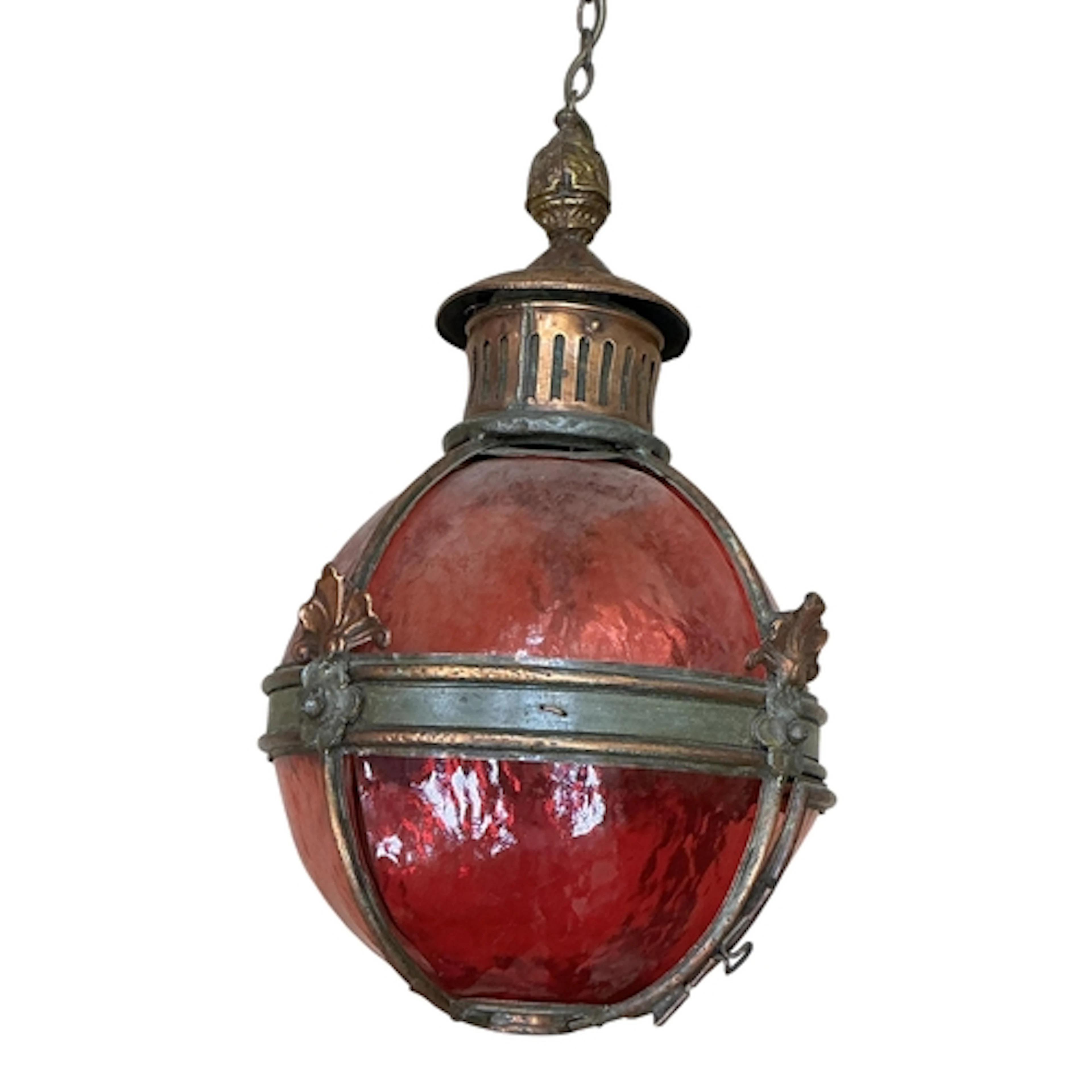An early 20th century coppered metal and ruby glass ovoid ha...