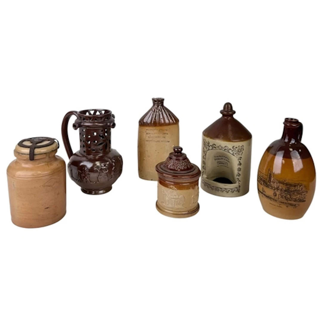 A GROUP OF ENGLISH MOSTLY 19TH CENTURY STONEWARE VESSELS To ...