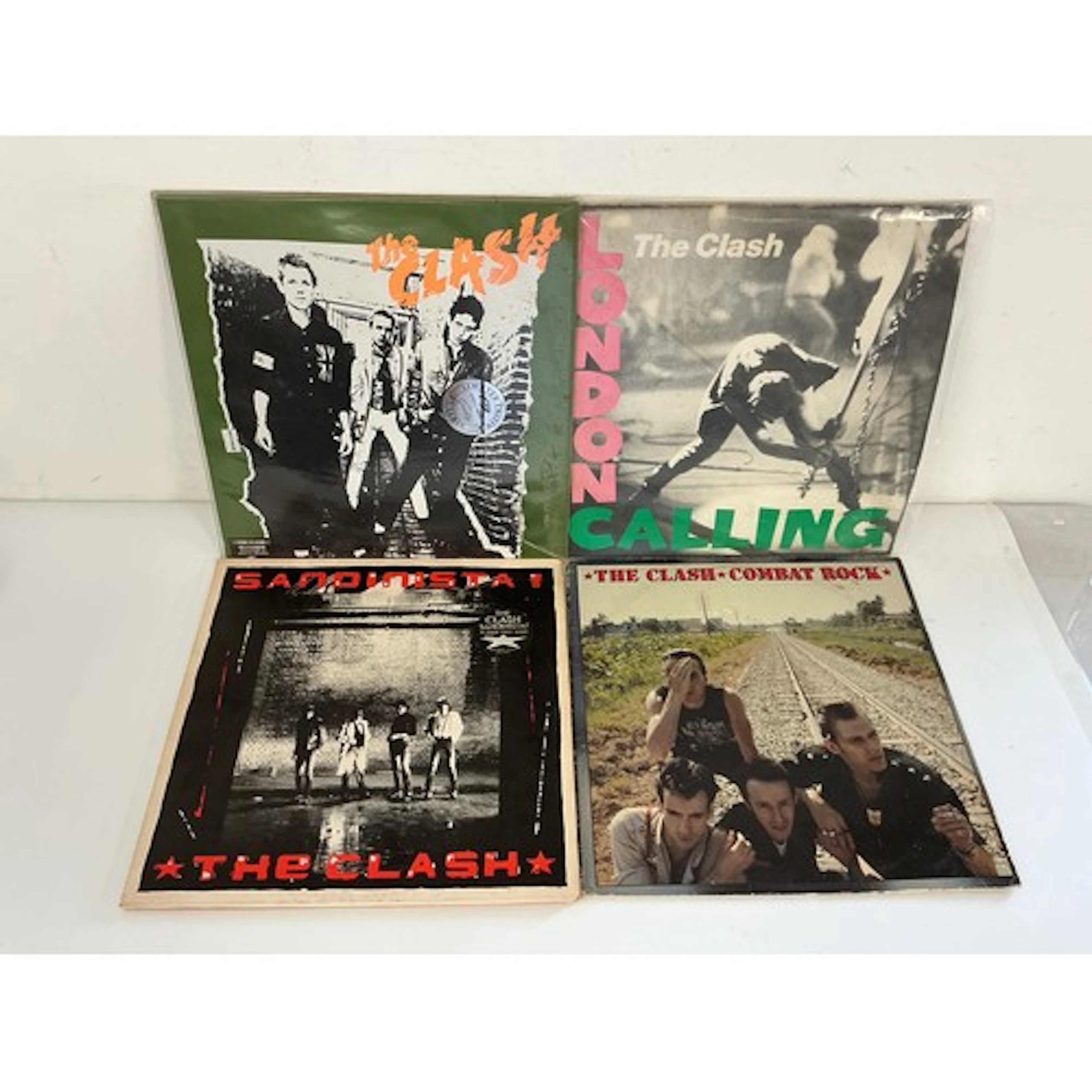 Four LPs by The Clash comprising London Calling, the self ti...
