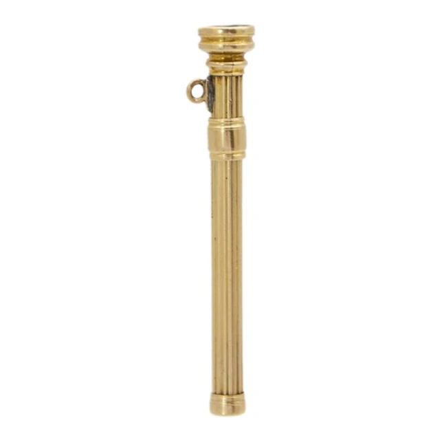 S. MORDAN & CO - A 10k propelling toothpick watch fob with b...