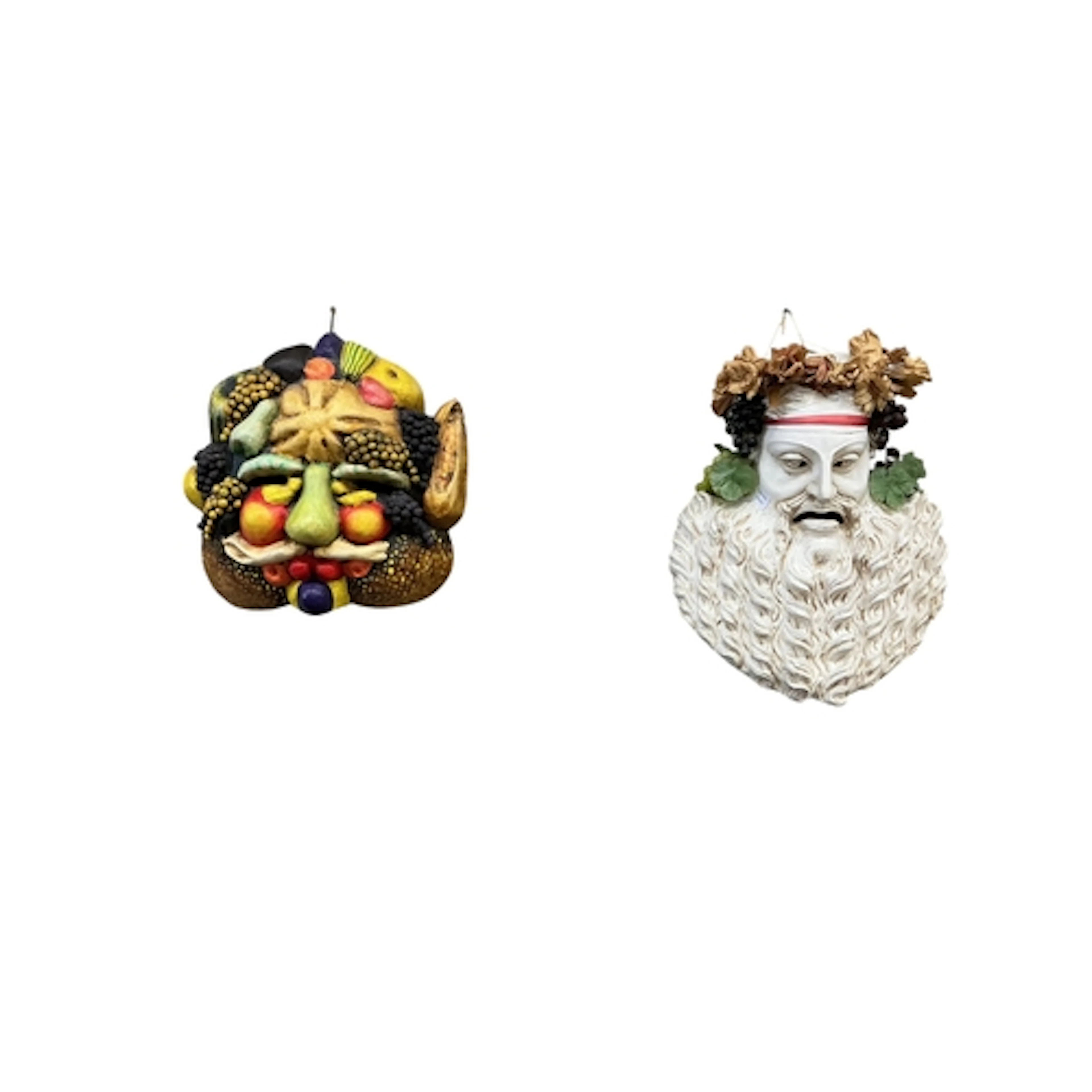 Two large Venetian carnival masks one of Dionysus the other ...