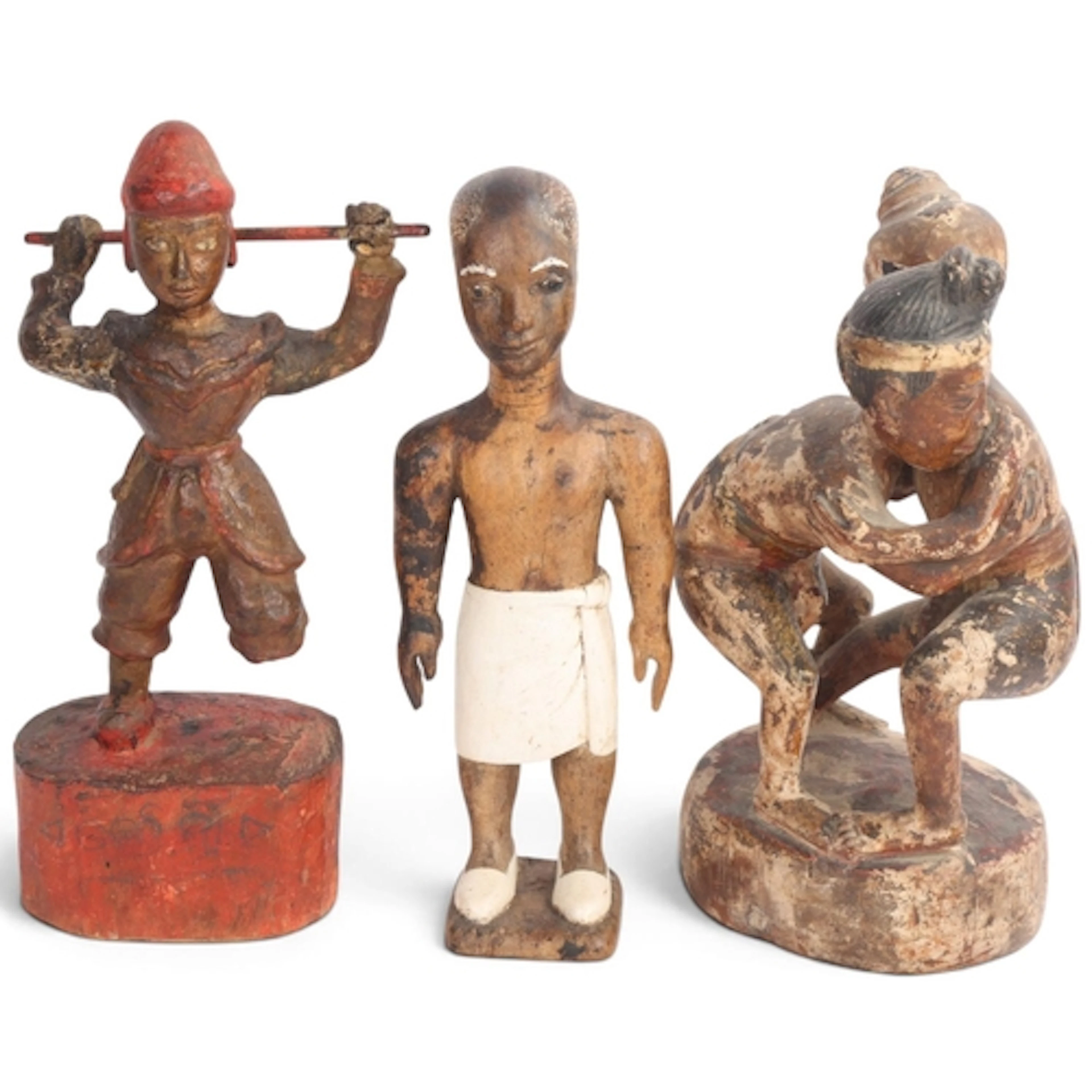 3 Indian figures, carved and painted wood, height 26cm