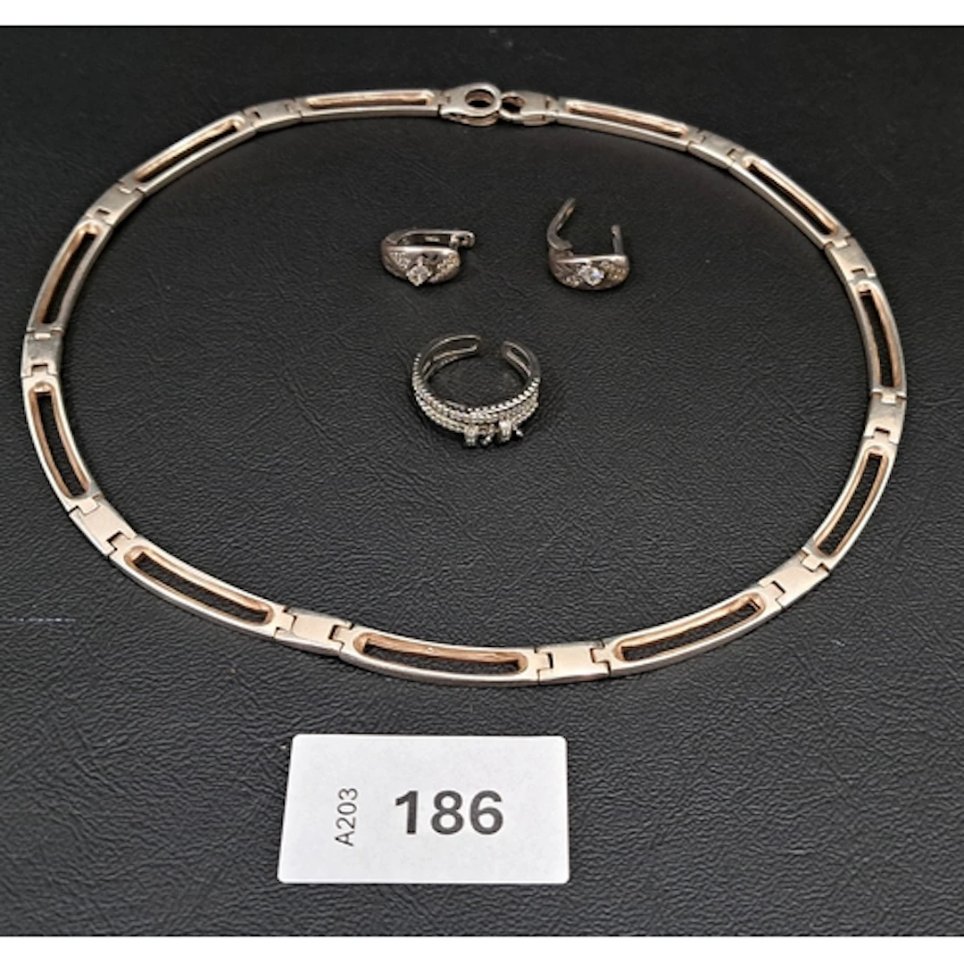 FOUR PIECES OF SILVER JEWELLERY comprising a pierced rectan...