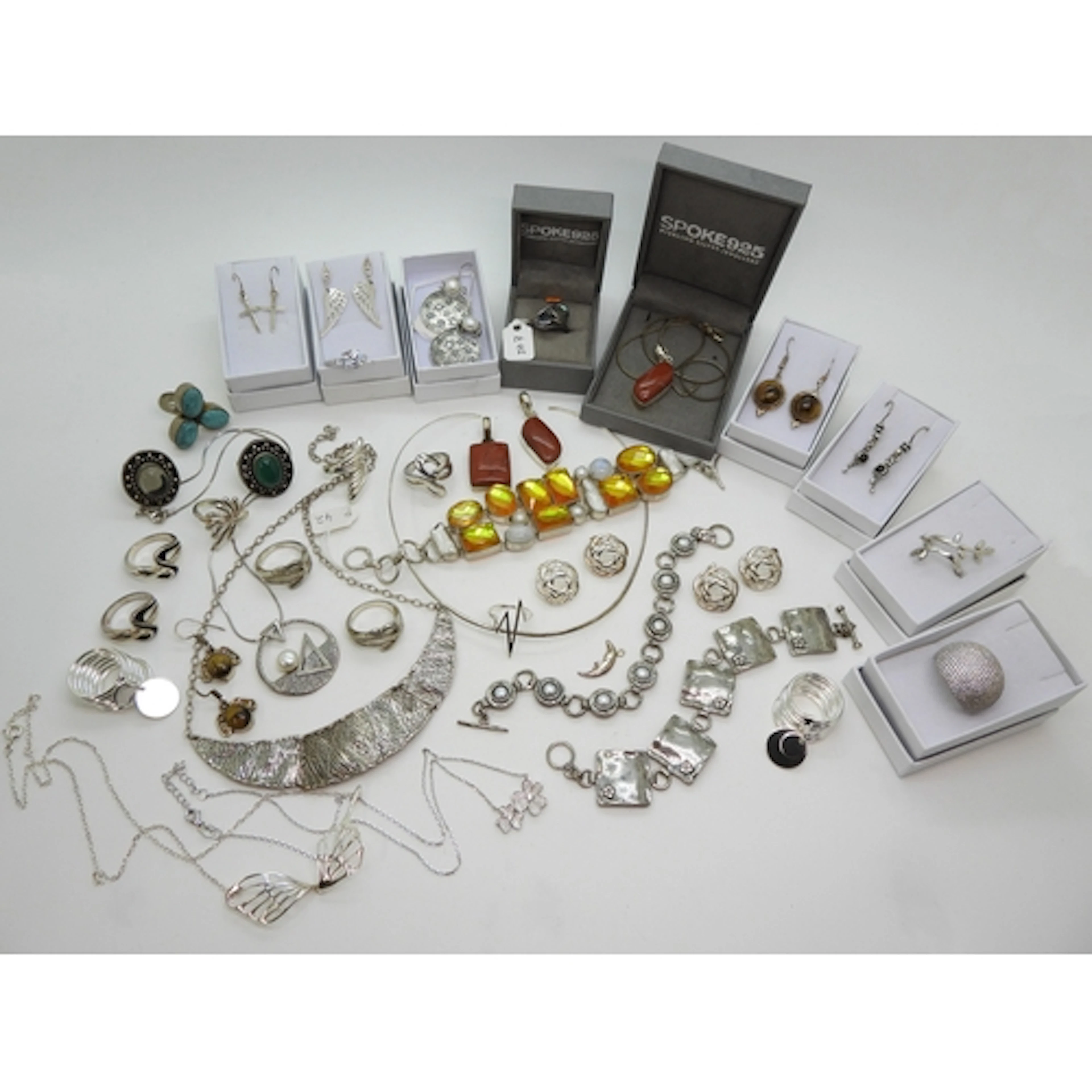 A collection of silver and white metal jewellery to include ...