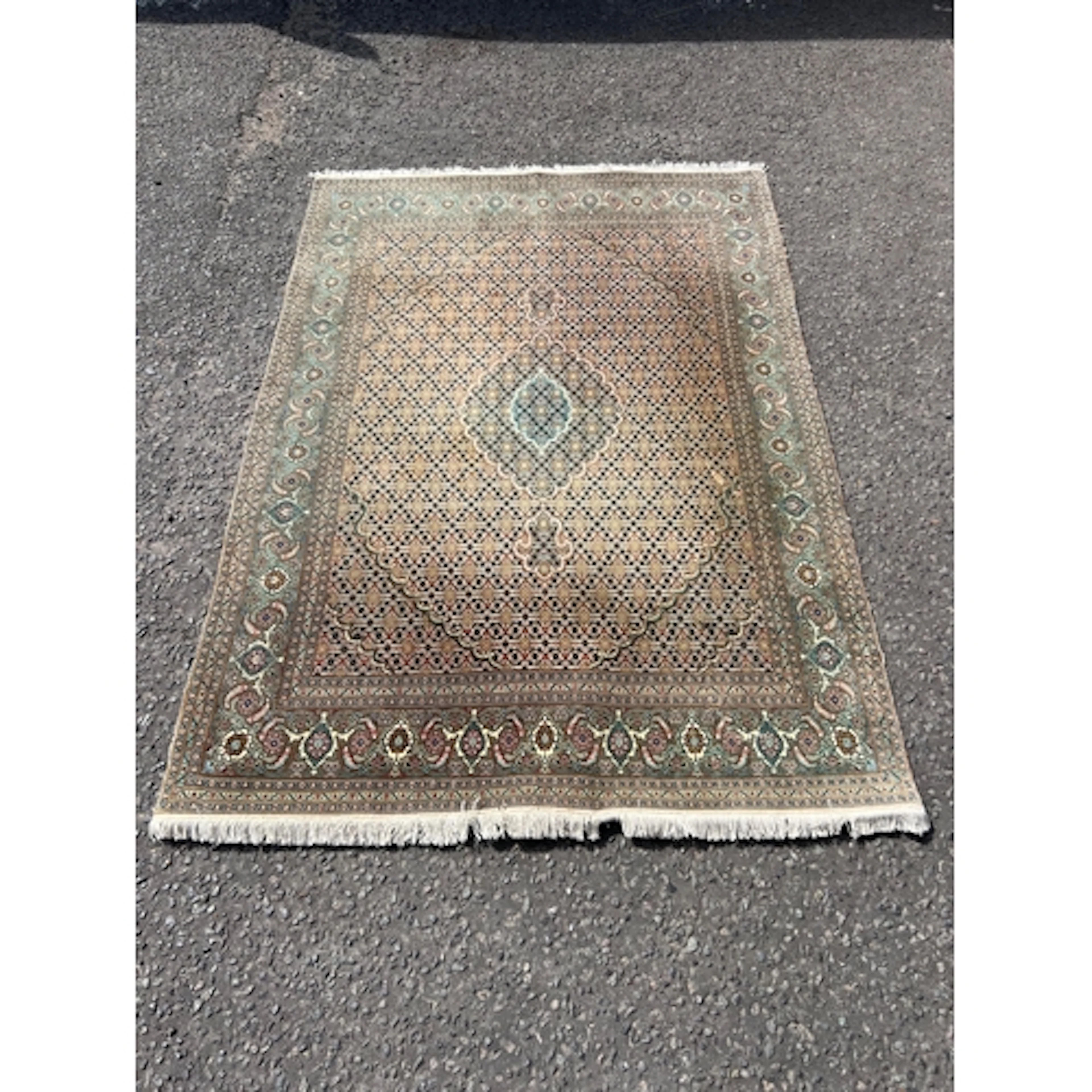 A FINE PERSIAN PART-SILK CARPET 215 x 147 cm
