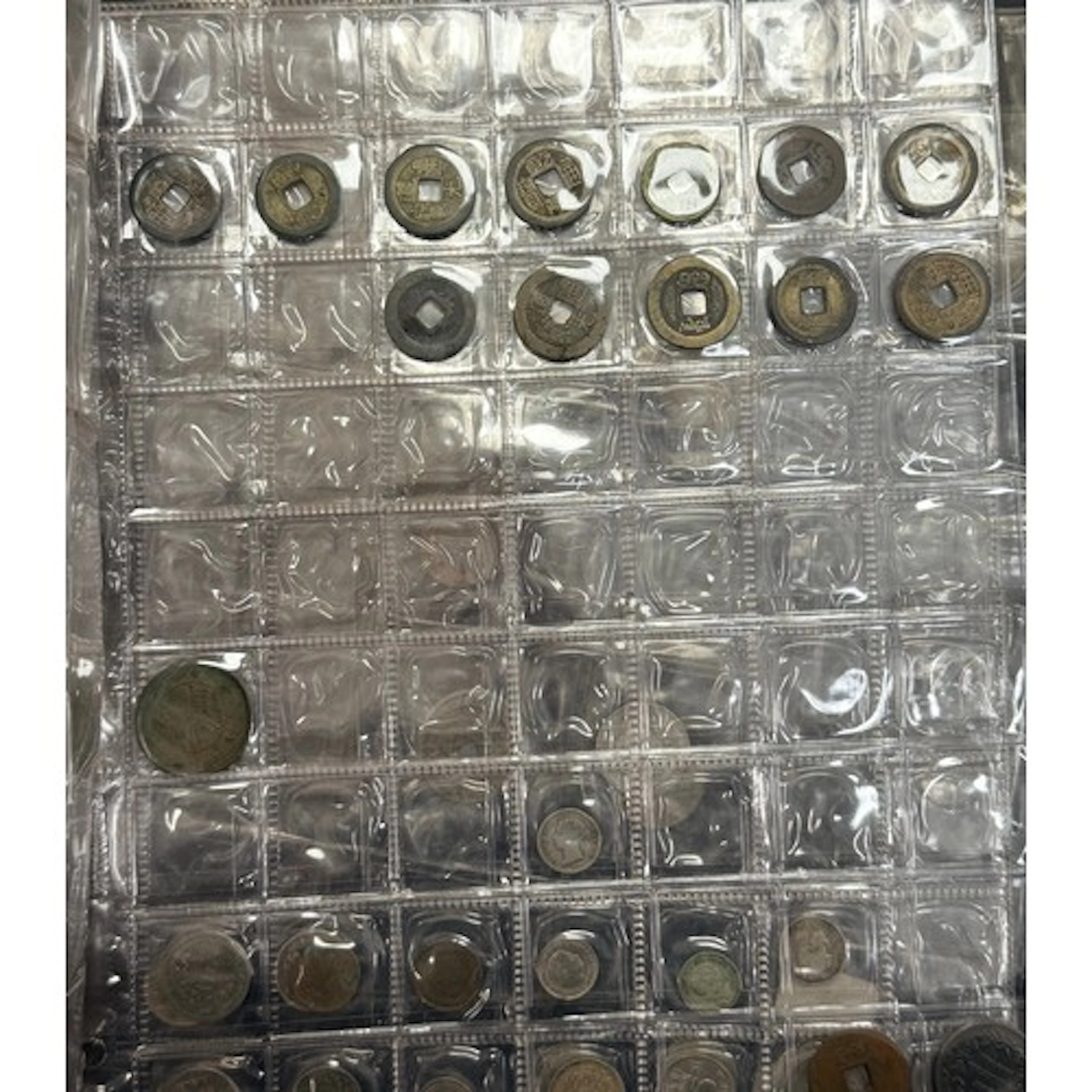 World Coin Collection - A well-filled album containing an ex...