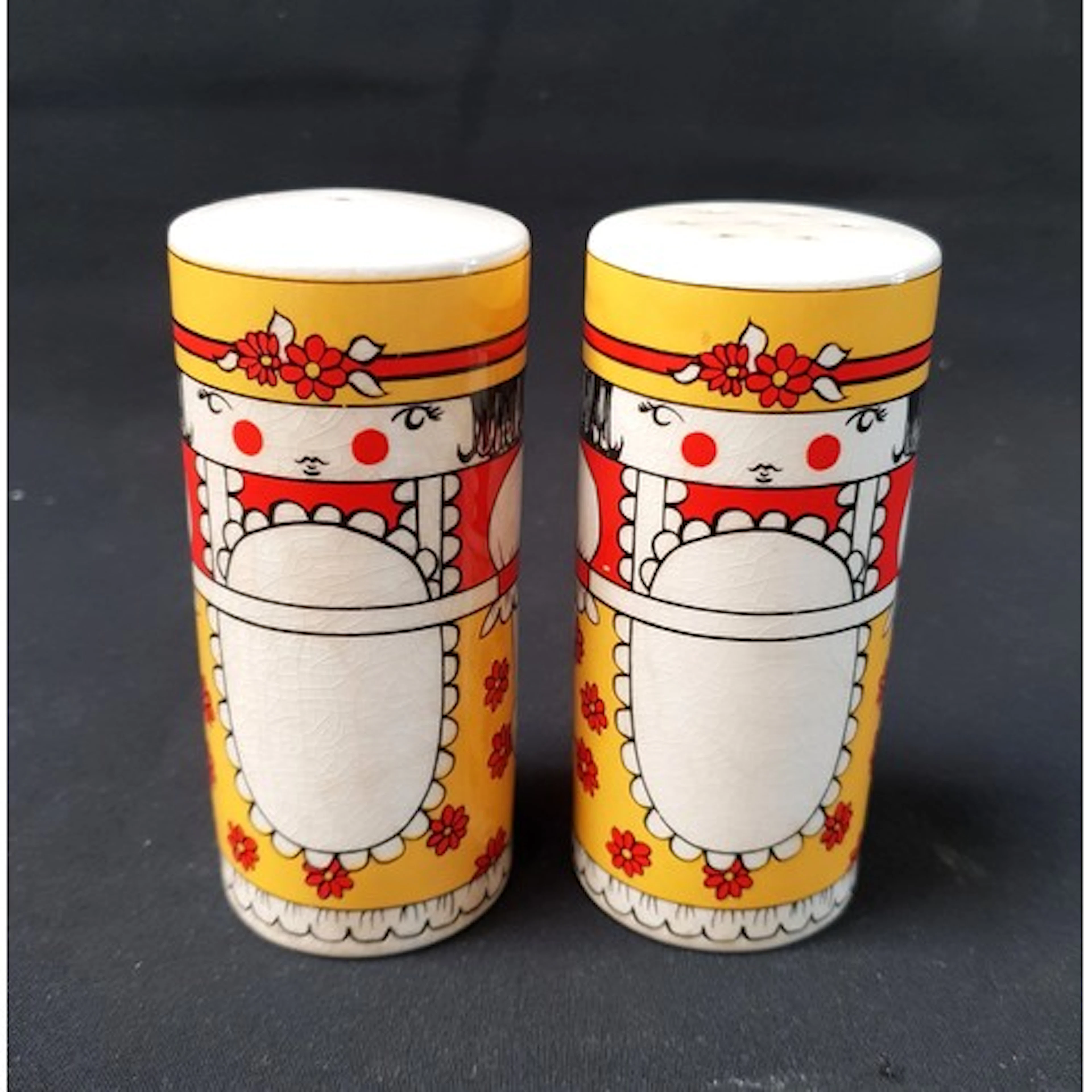 PAIR OF CARLTON WARE SALT AND PEPPER SHAKERS with the design...