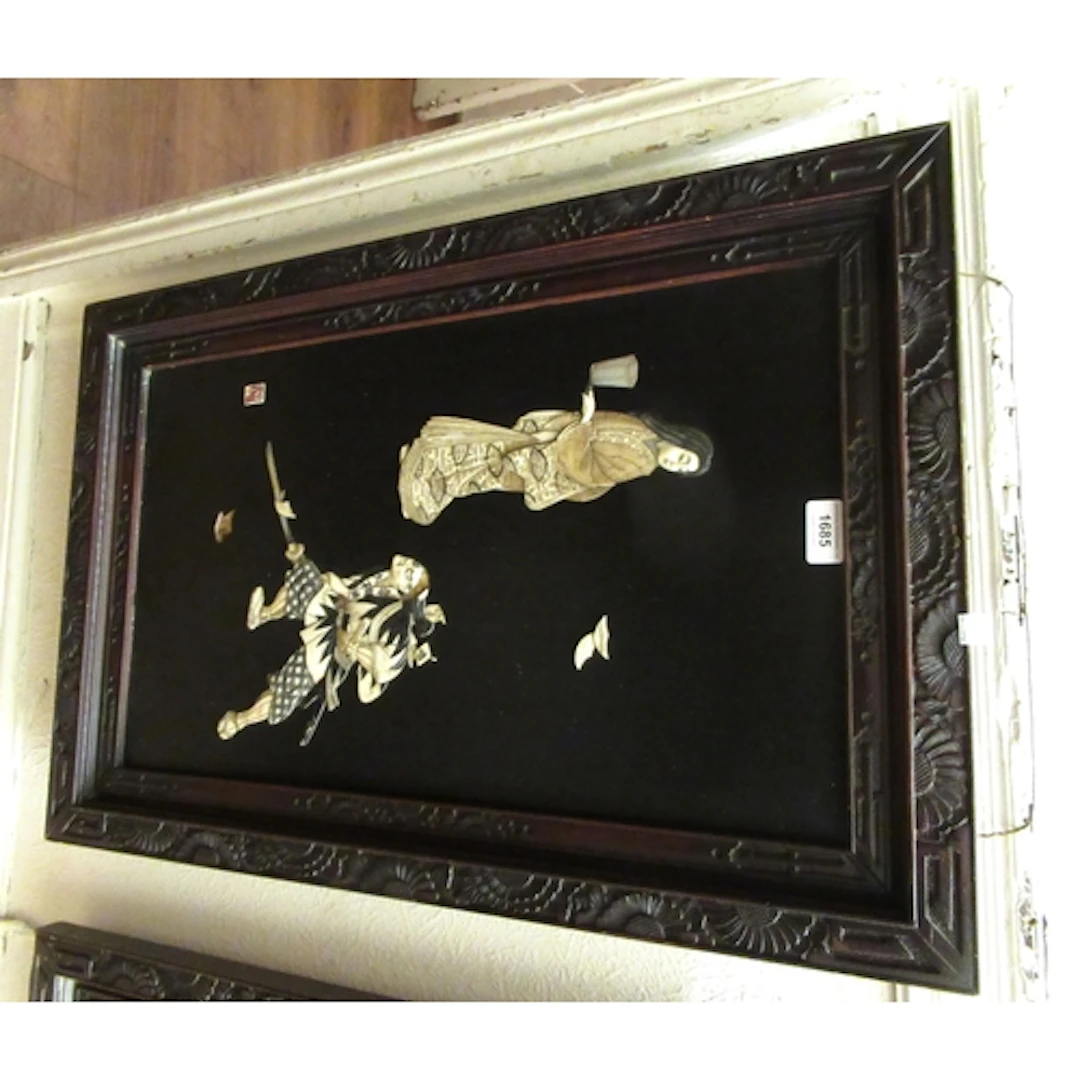 Pair of late 19th Century Japanese lacquer panels, relief de...