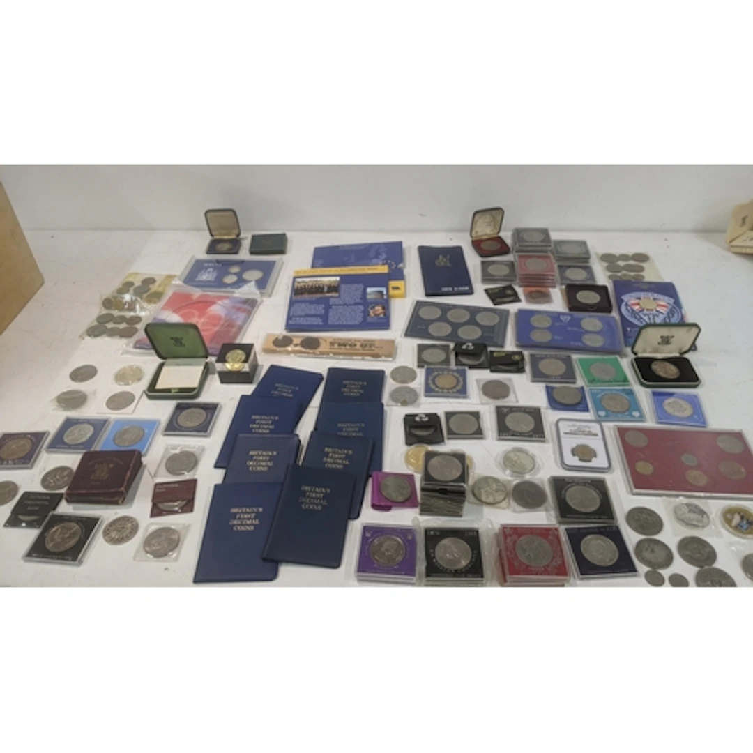 A large collection of commemorative coins, a 2001 uncirculat...
