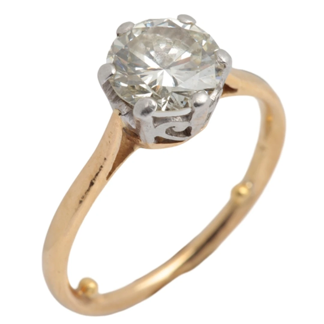 A solitaire diamond ring, claw-set with a brilliant-cut diam...