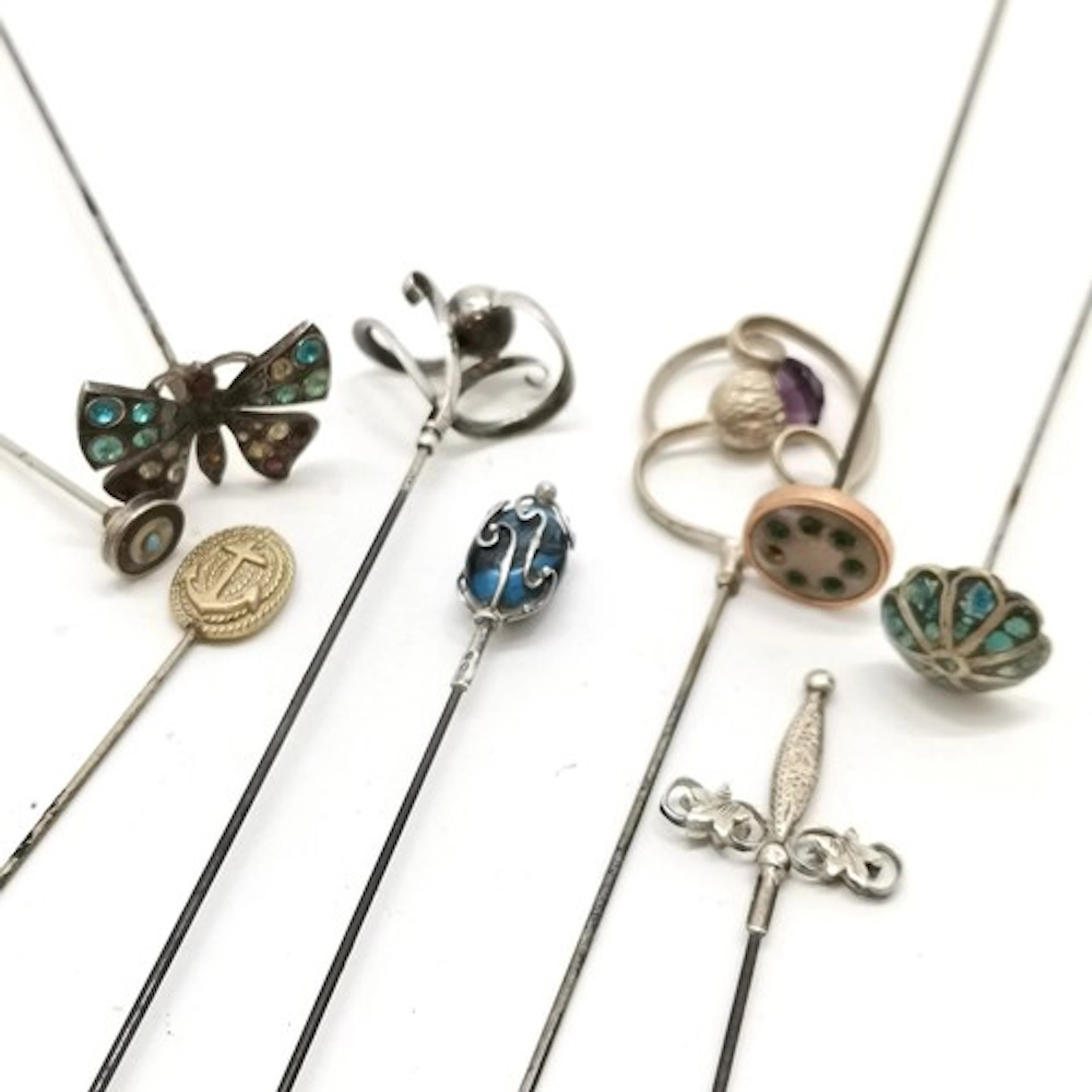9 x antique hat pins inc silver Charles Horner (28cm), sword...