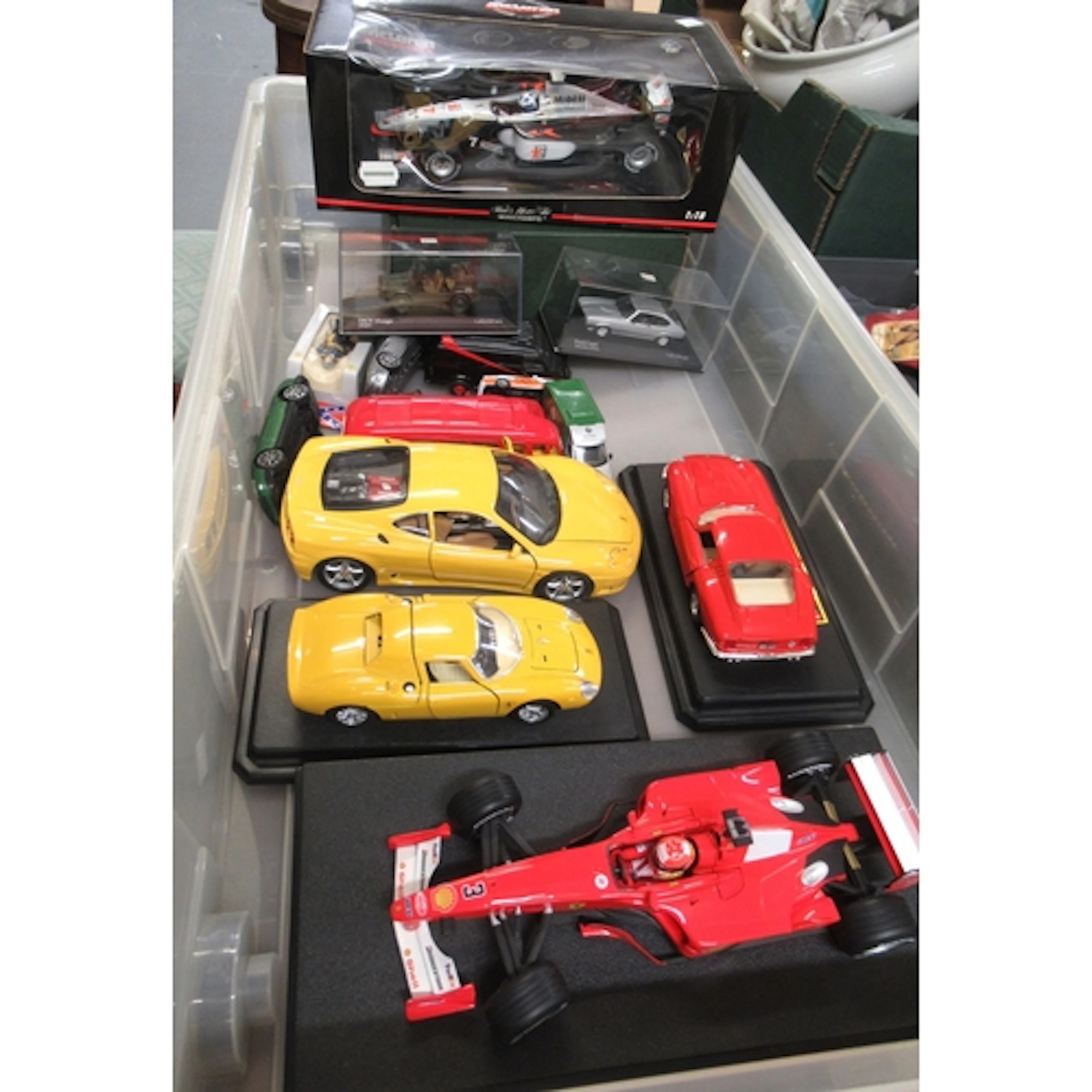 Two 1:18 scale Formula One model cars, various larger scale ...