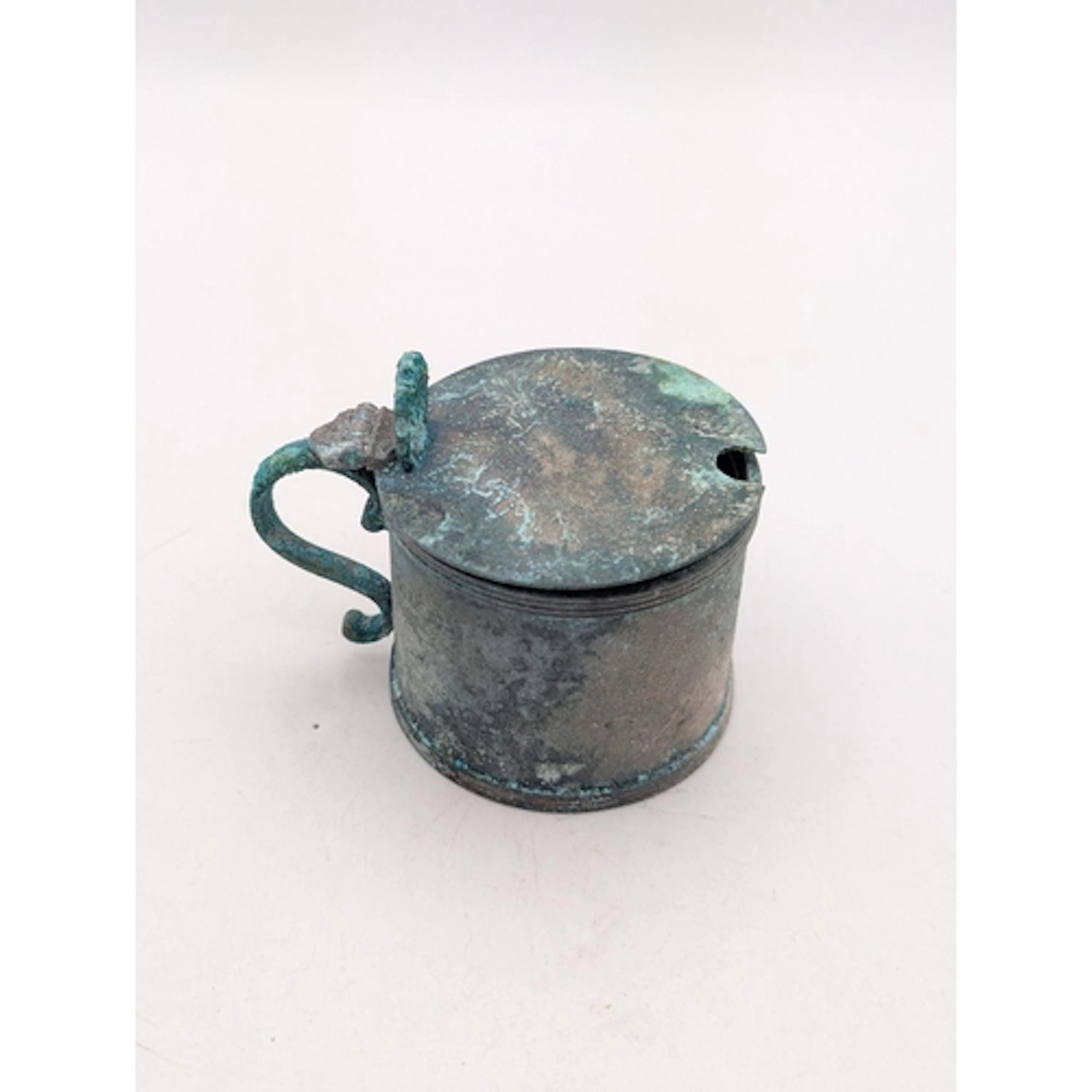 A silver lidded mustard pot with a blue glass liner with a w...