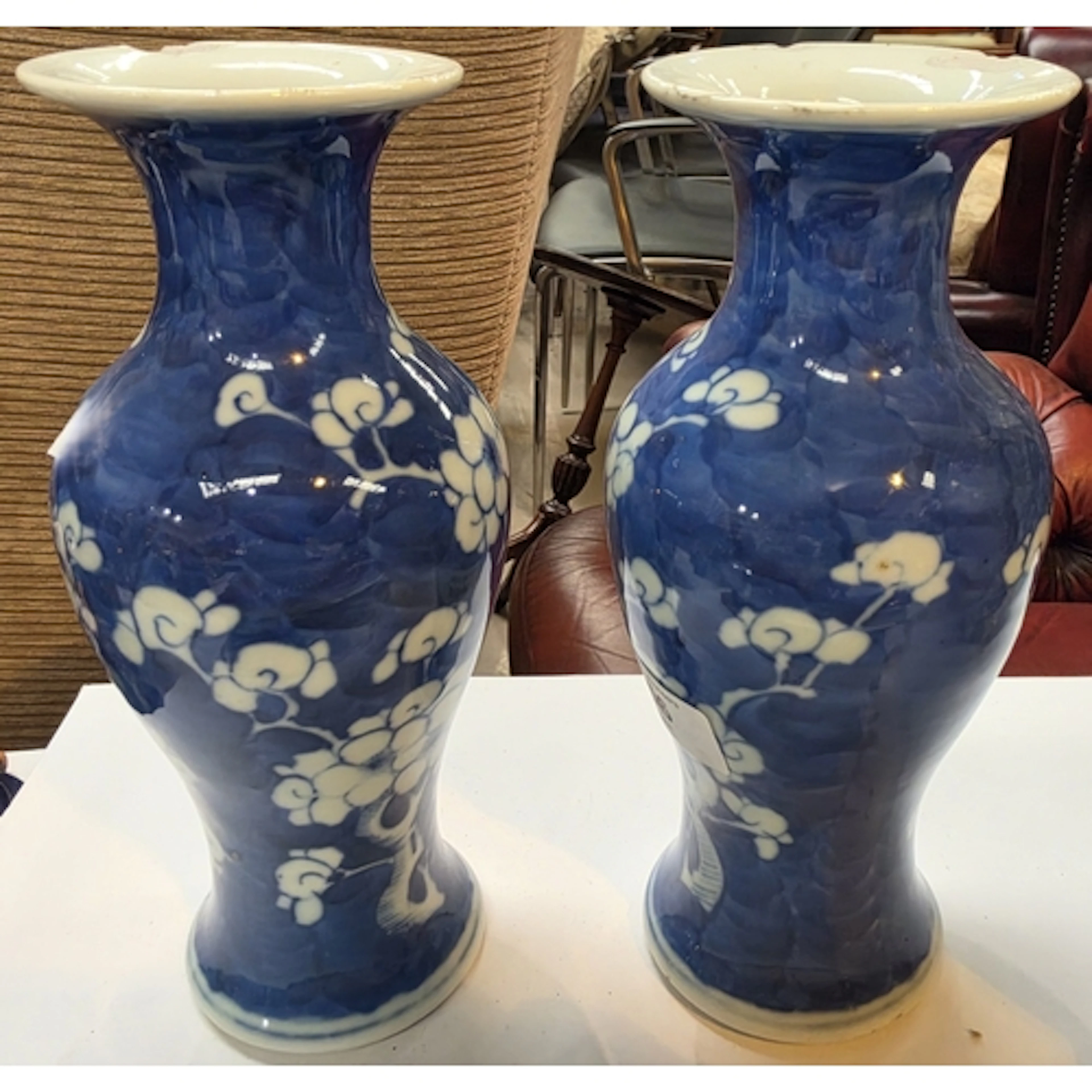 A pair of Chinese porcelain baluster shaped vases, floral de...