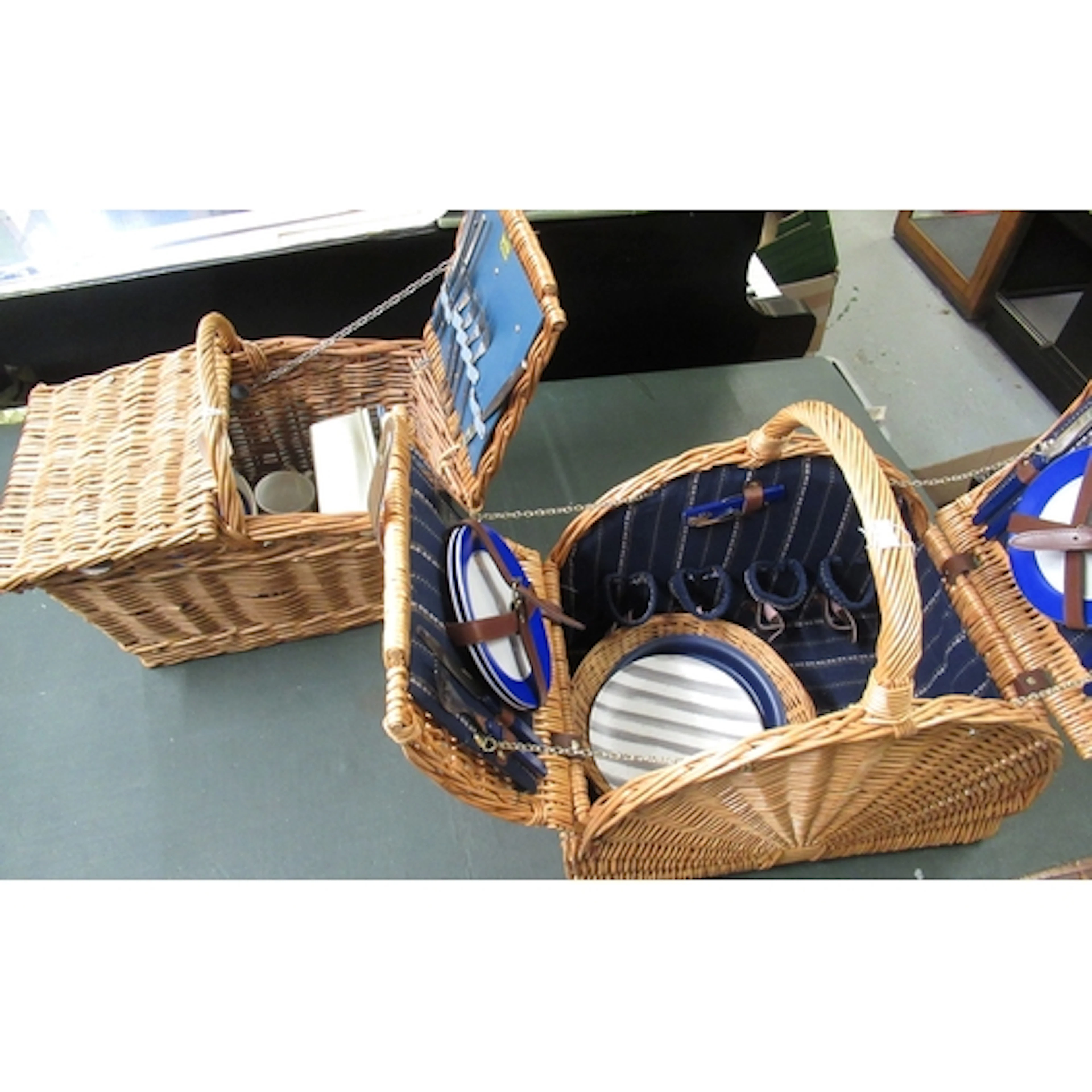 Two wicker work hampers, containing various plates and picni...