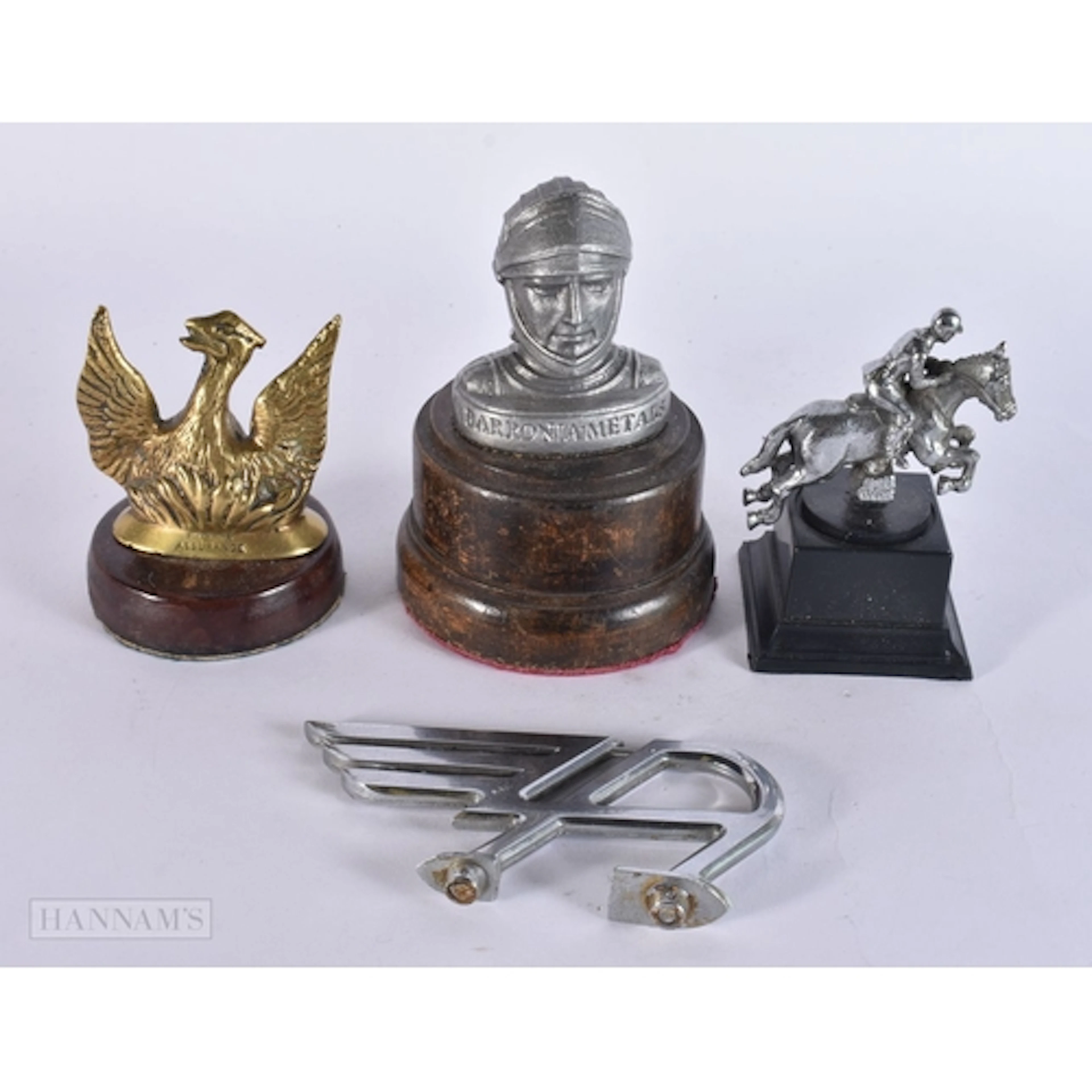 FOUR CAR MASCOTS including a jockey on horseback. (4)