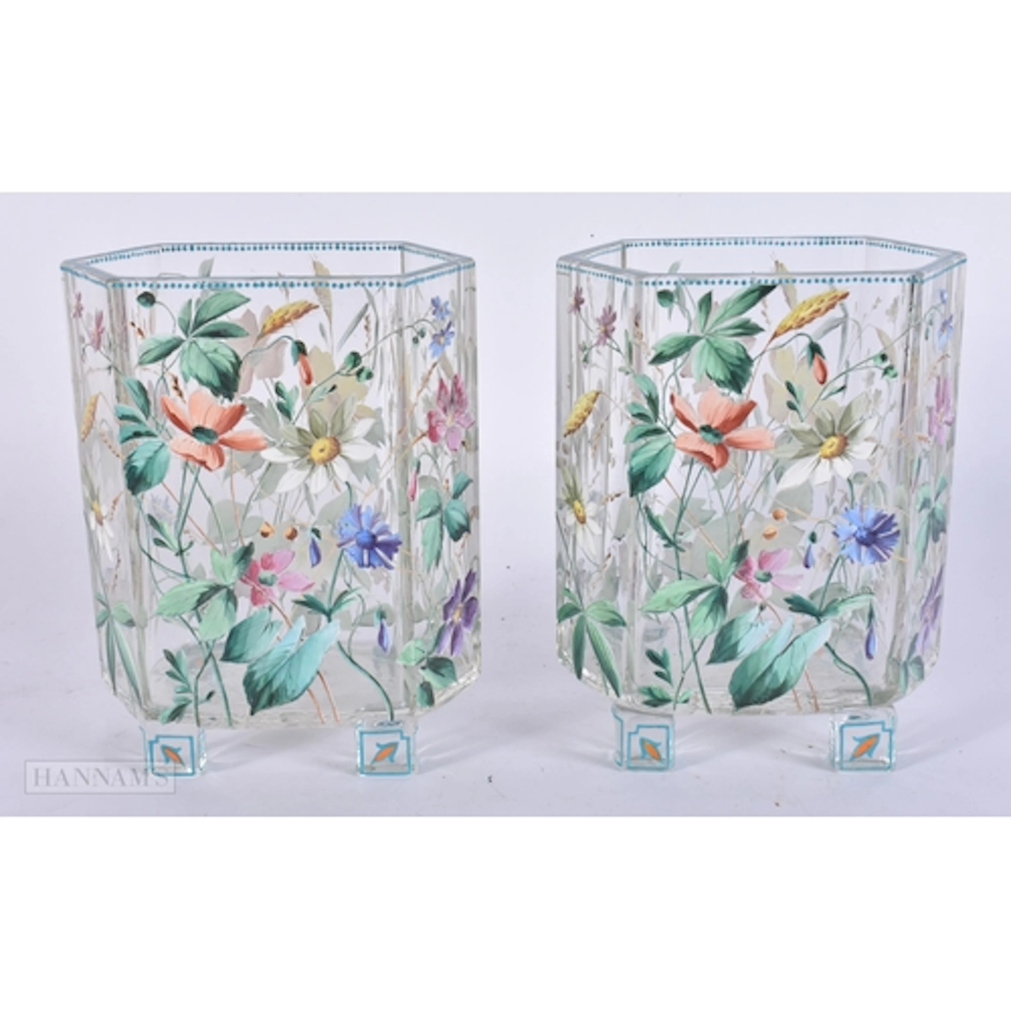 A PAIR OF AESTHETIC MOVEMENT ENAMELLED GLASS VASES of hexago...