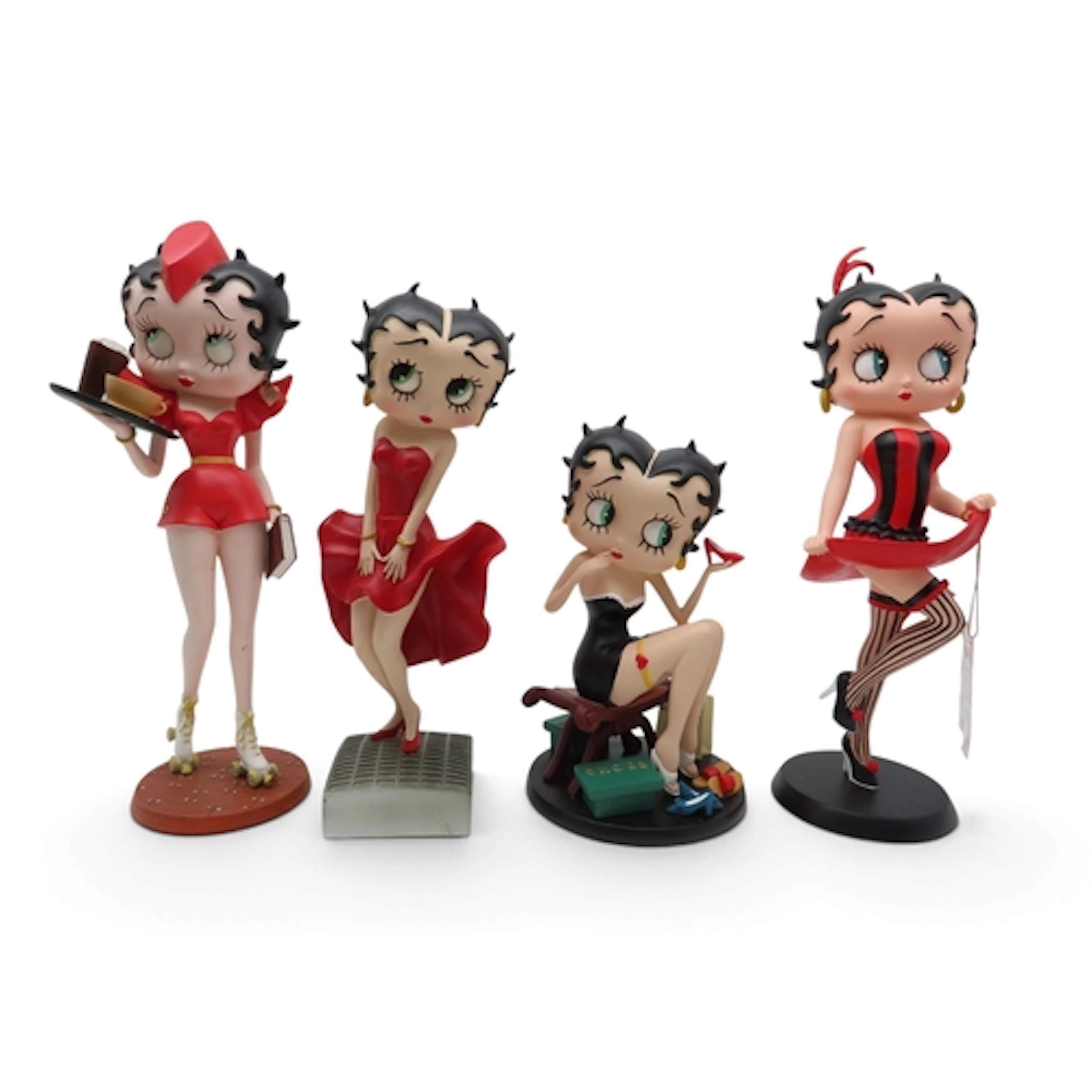 Four Betty Boop resin figures including Diner Waitress on ro...
