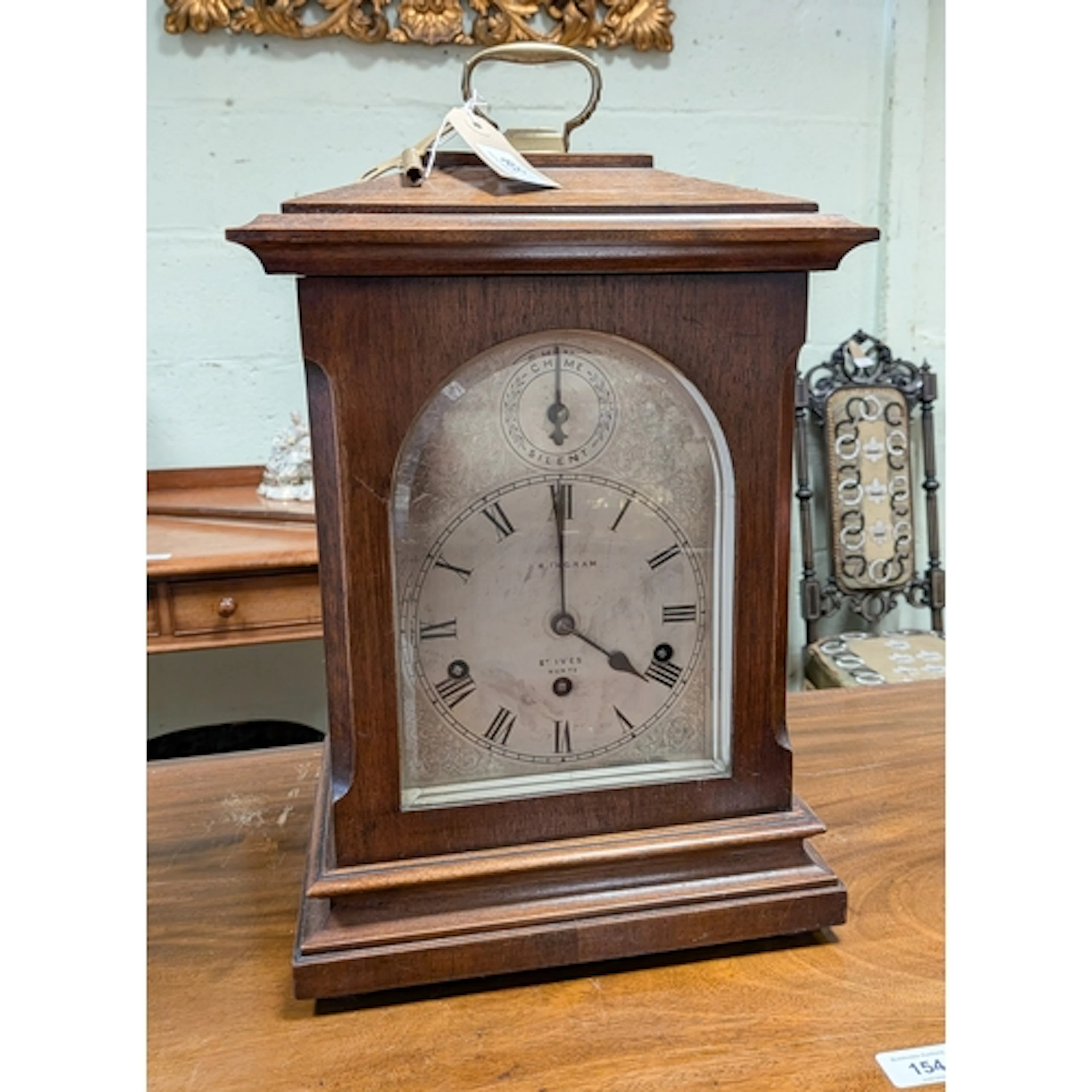 A Victorian mahogany chiming mantel clock with silver dial b...