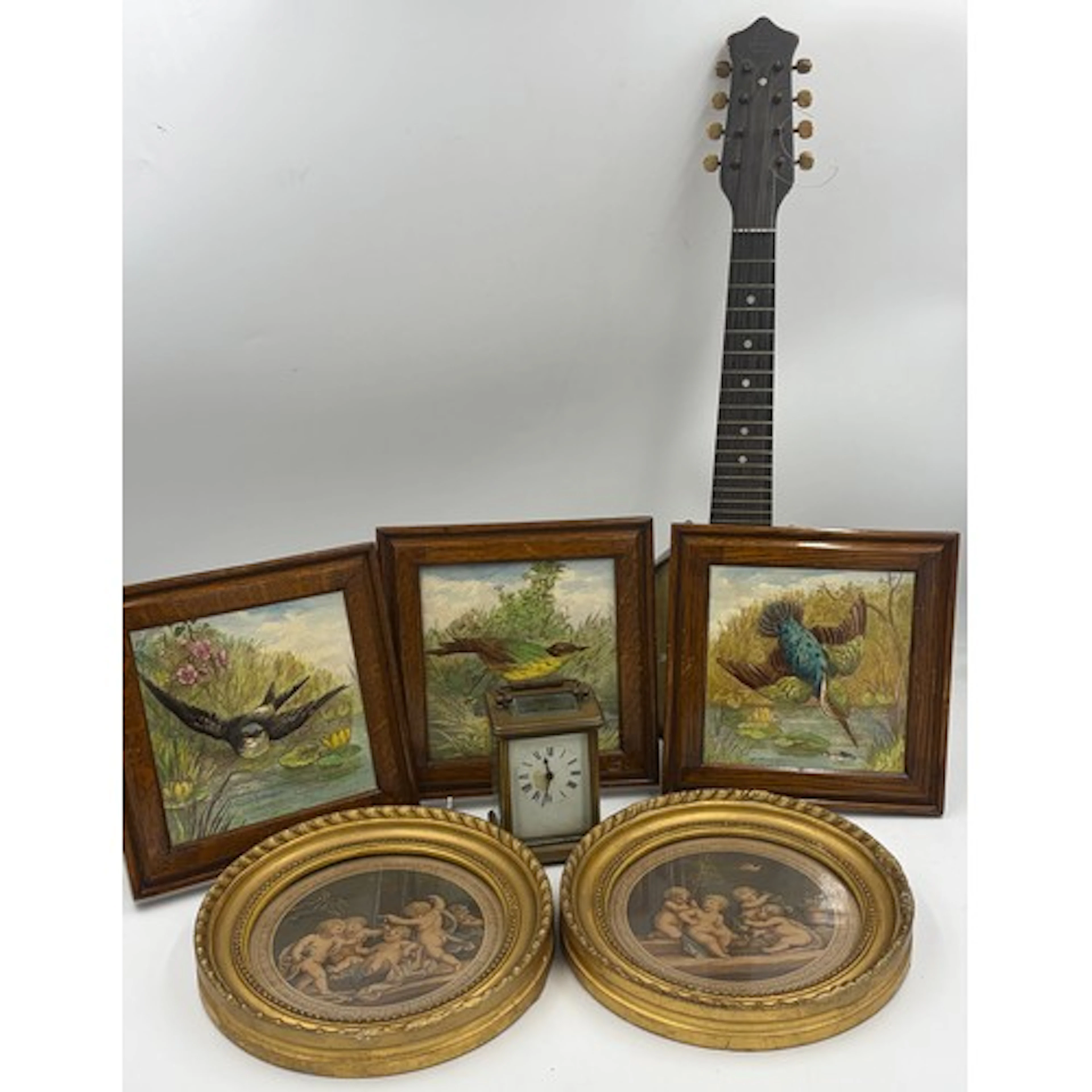 A miscellany to include three hand painted tiles in frames f...