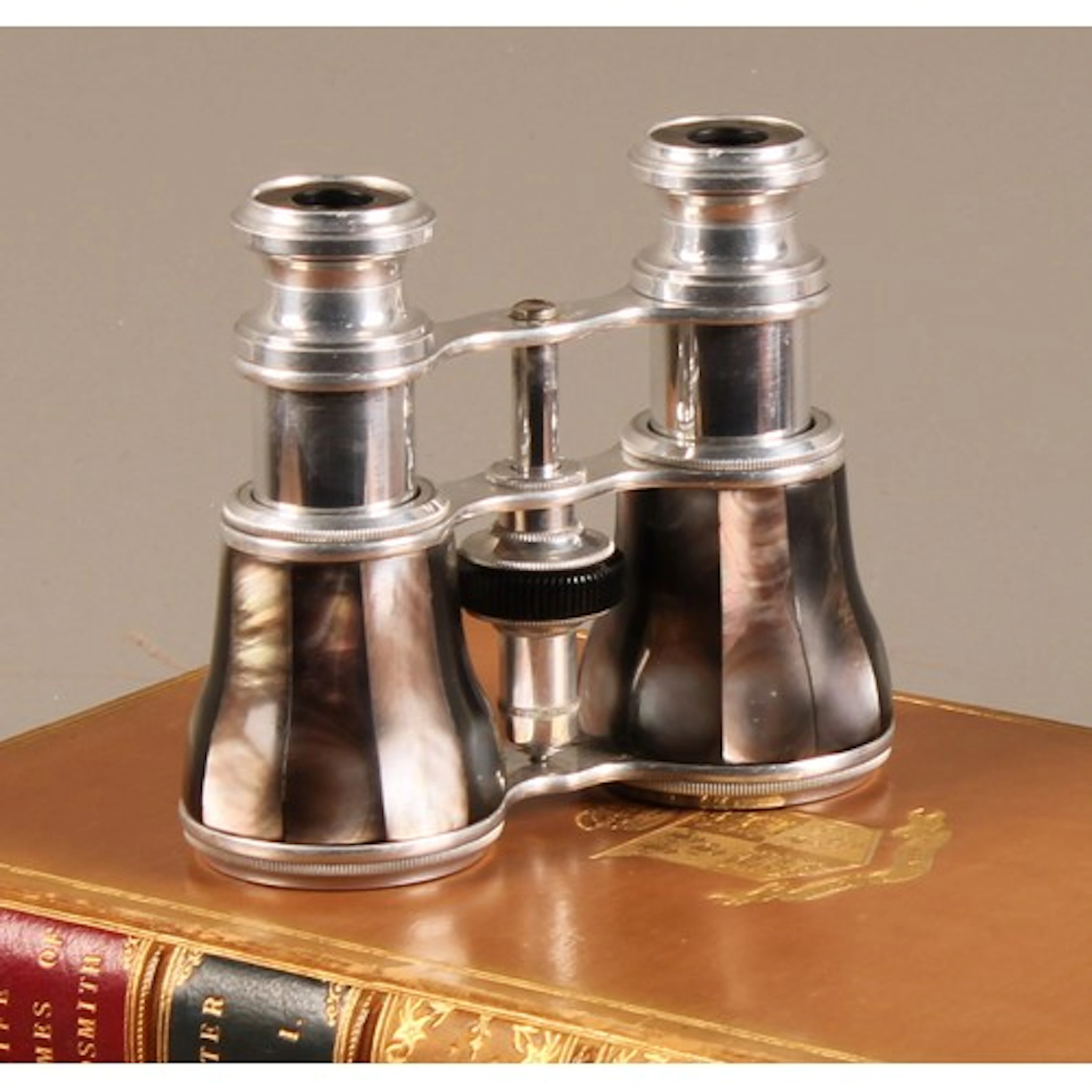 A pair of 19th century German mother of pearl opera glasses,...