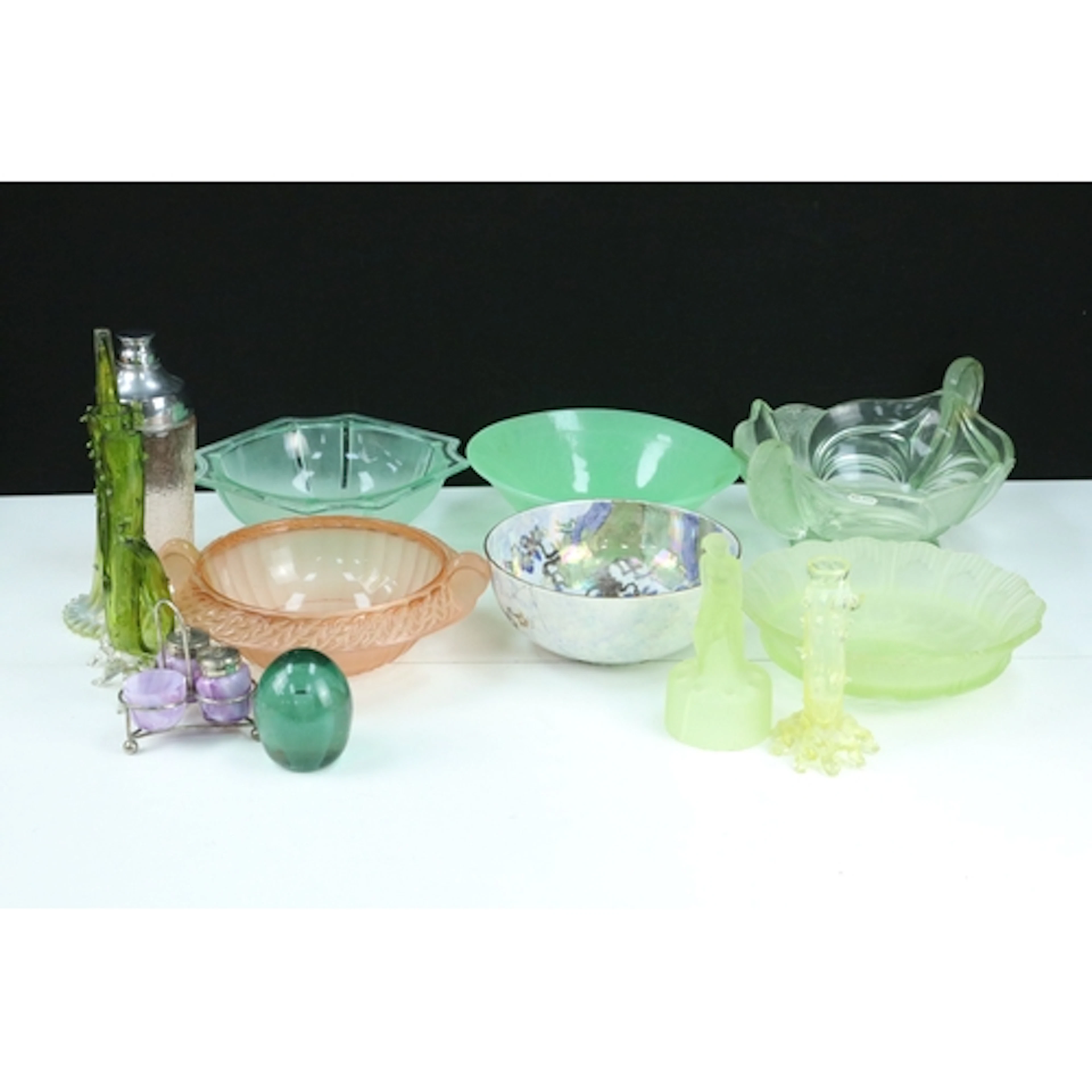 Early 20th century uranium glass flower frog in the form of ...