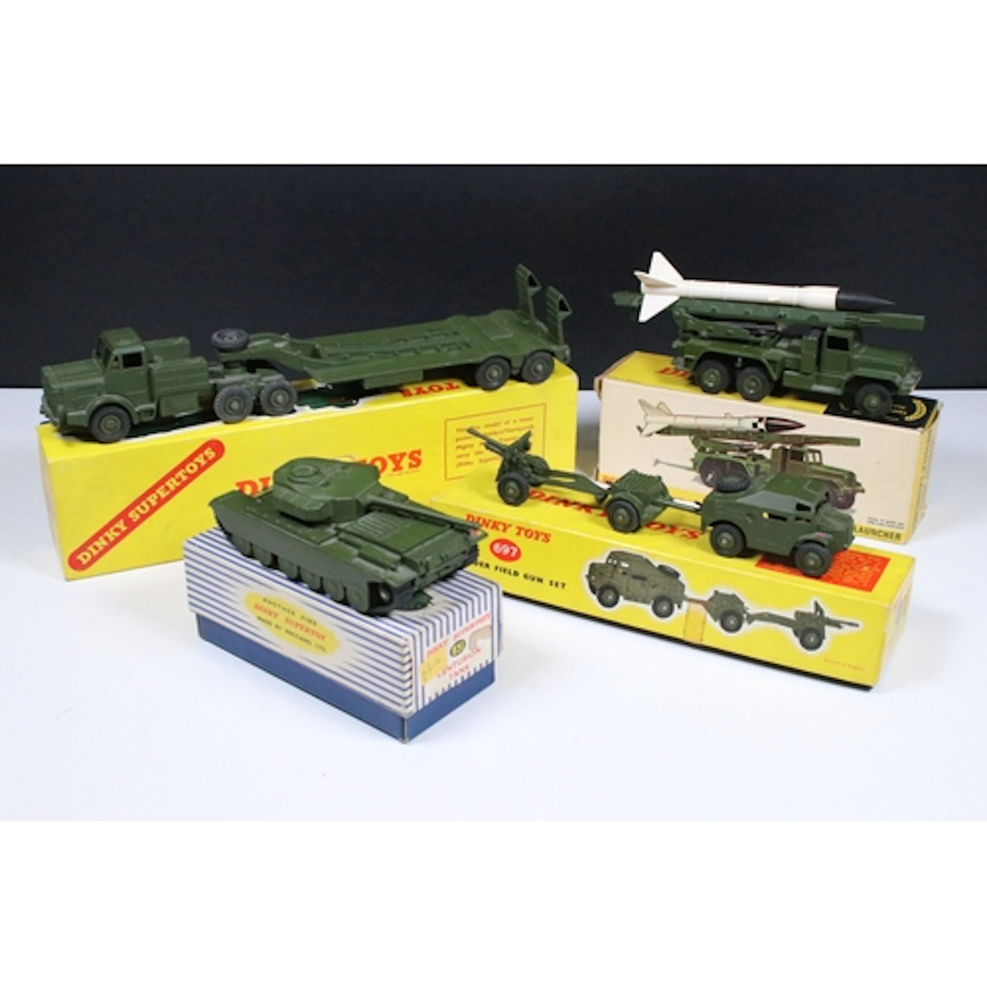 Four boxed Dinky military diecast models to include 660 Tank...
