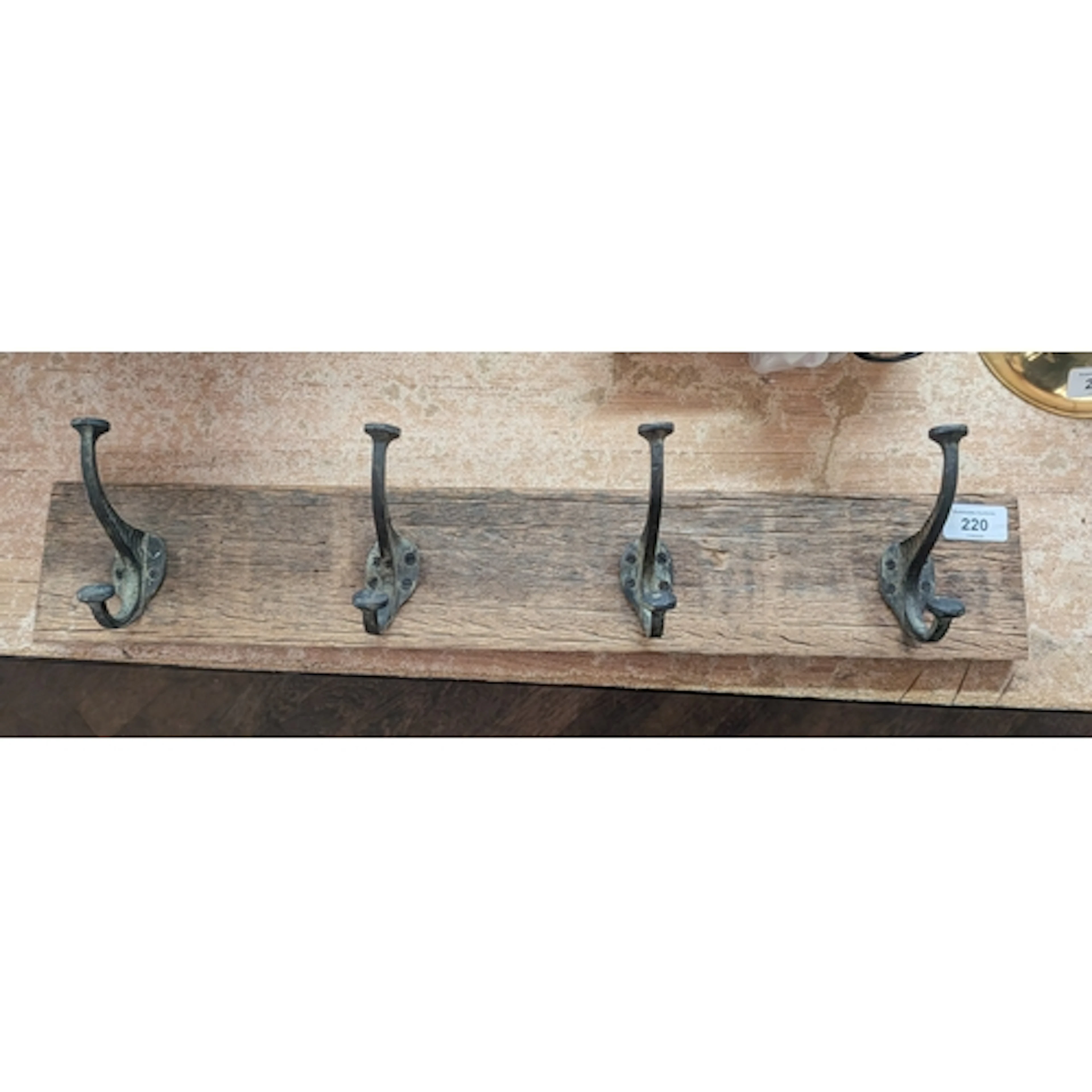 A vintage style four division coat hook