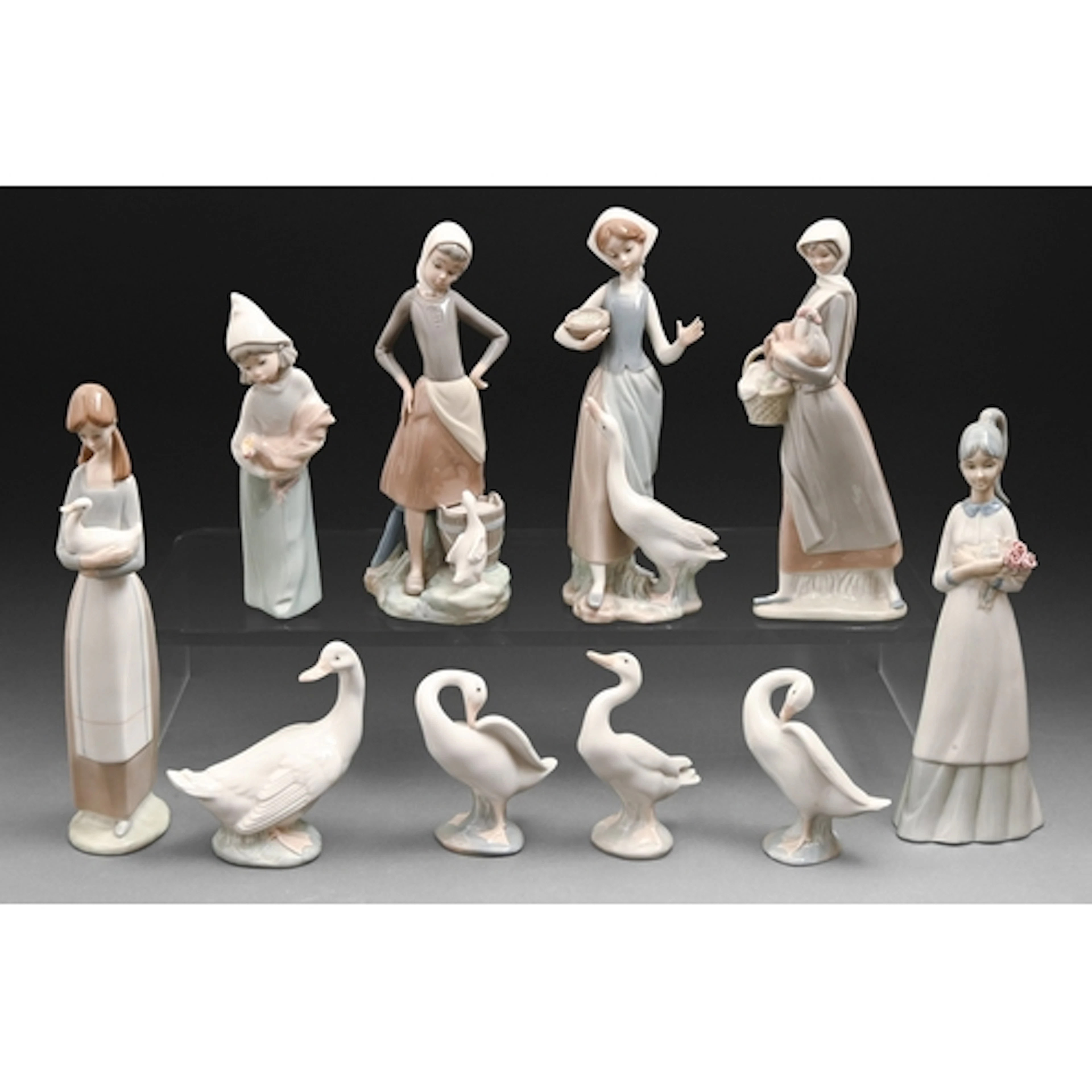 Ten Lladro, Nao and other figures and geese, 27cm h and smal...