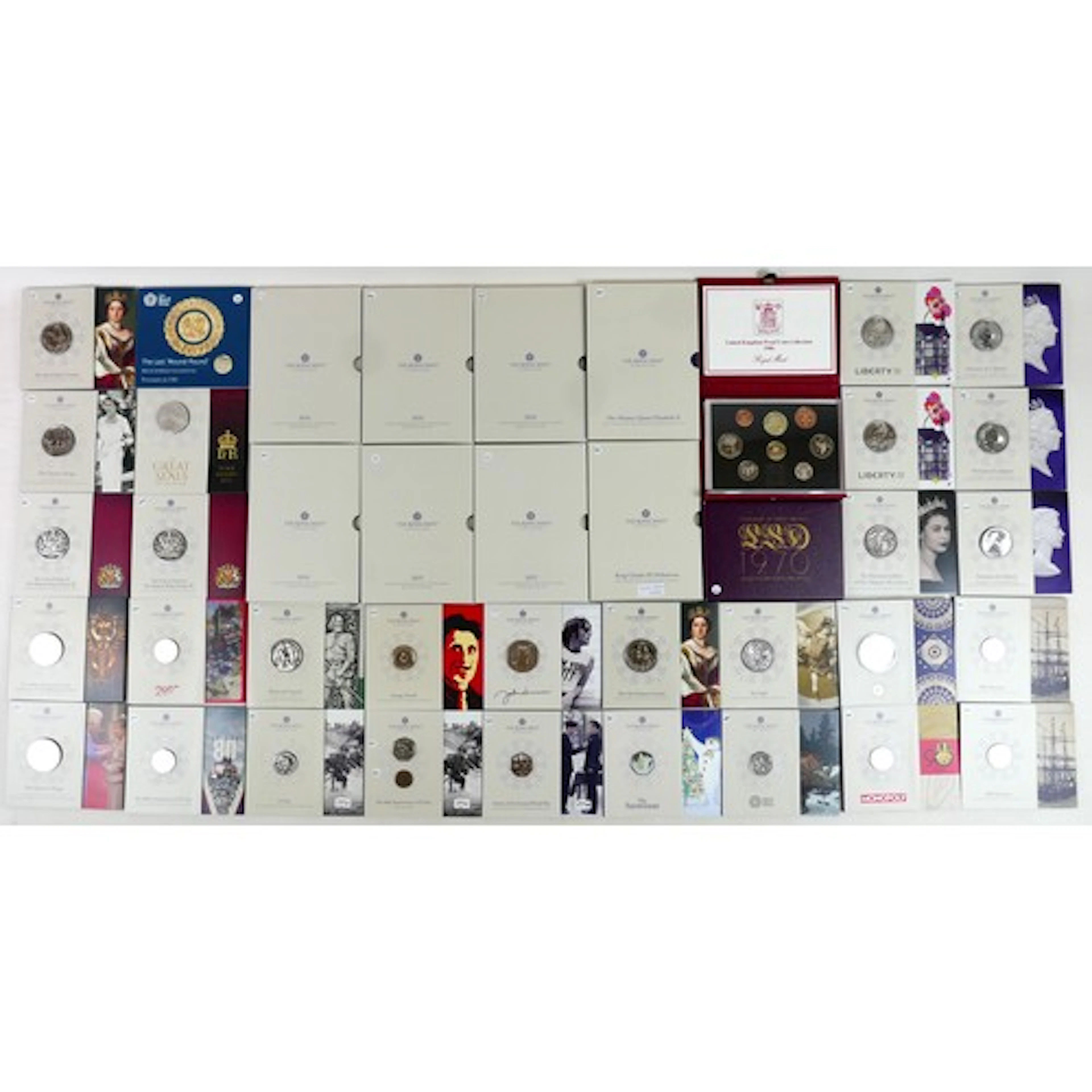 A collection of thirty Royal Mint Cupro-nickel proof coins a...
