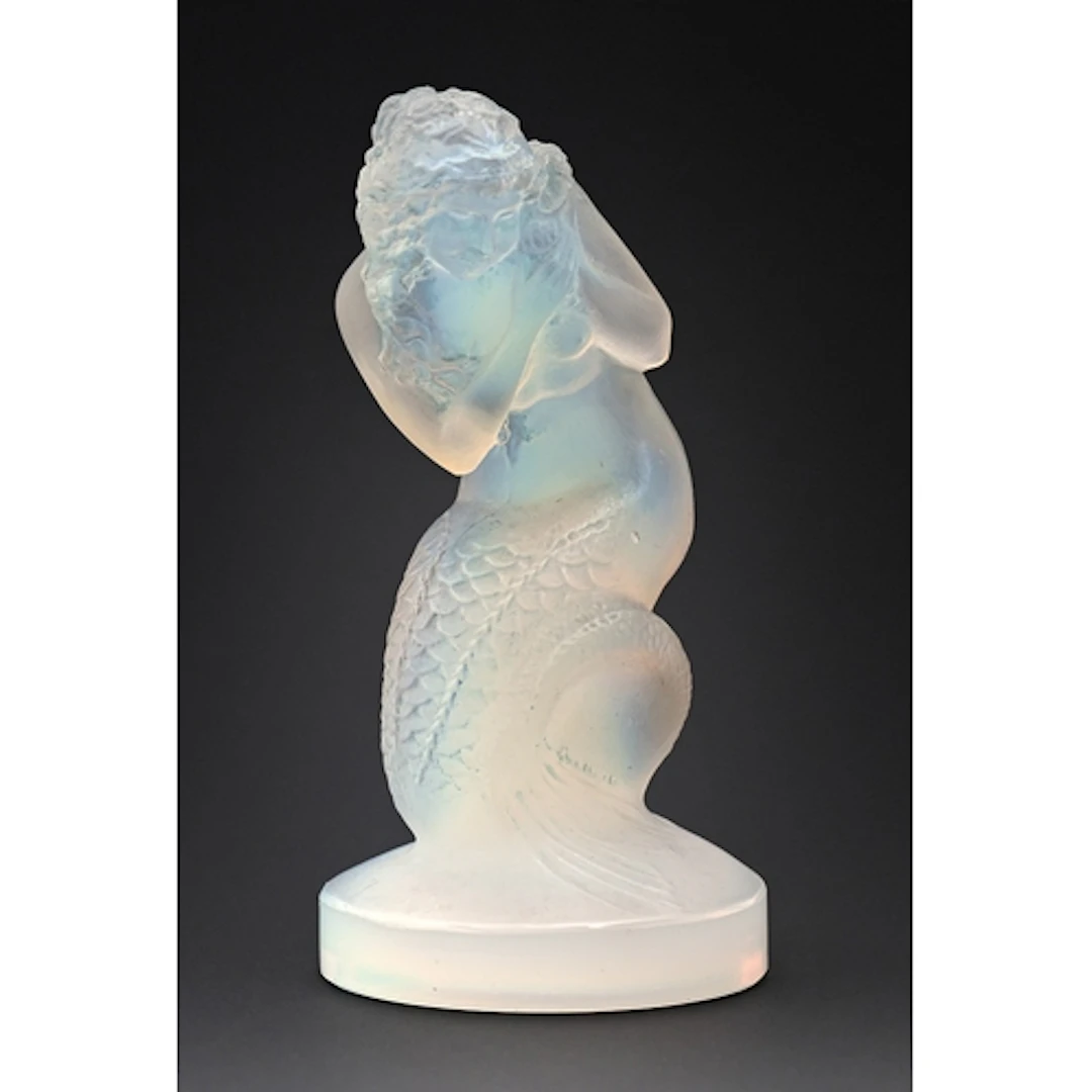 "Naiade". A Lalique semi-opalescent glass car mascot, c1930,...