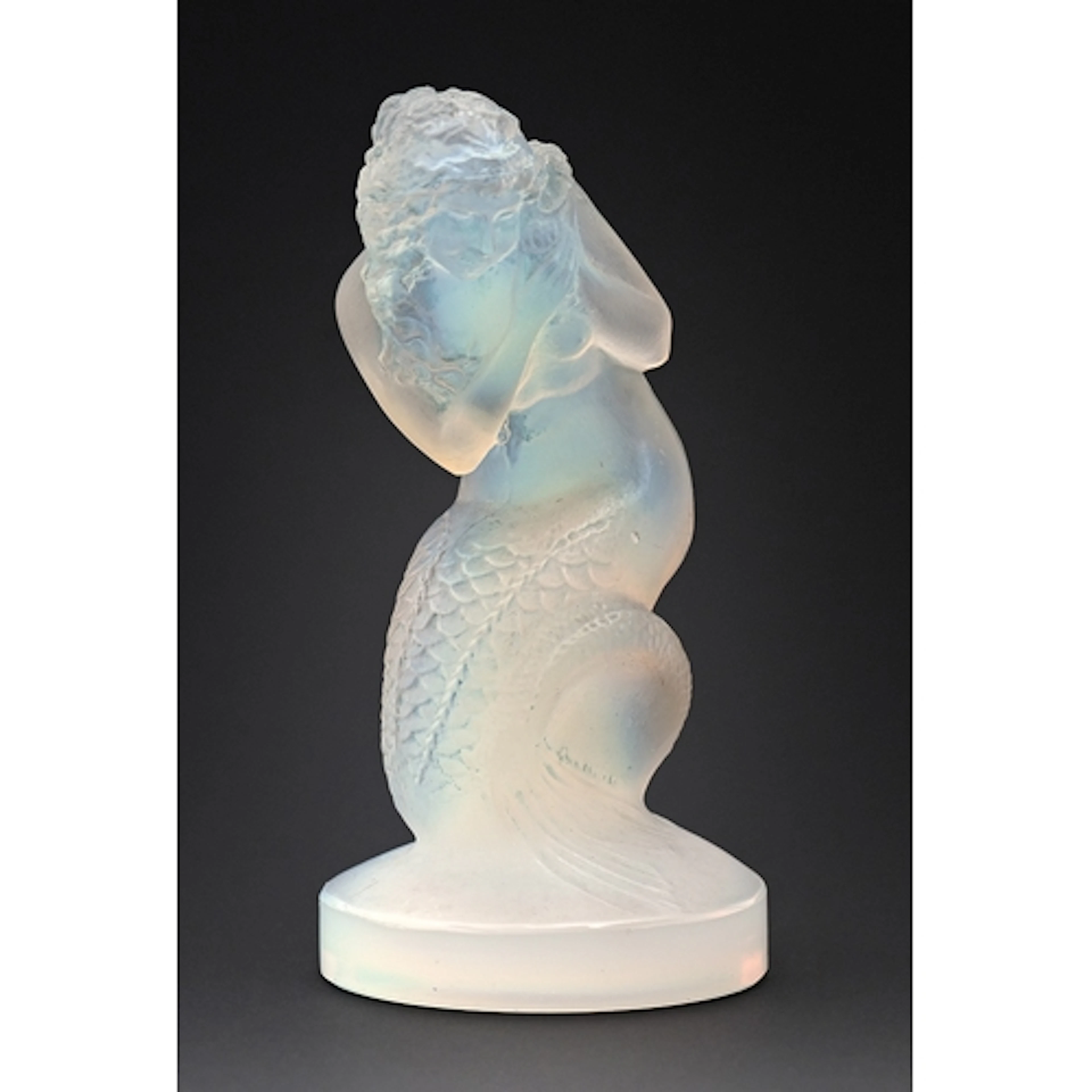 "Naiade". A Lalique semi-opalescent glass car mascot, c1930,...