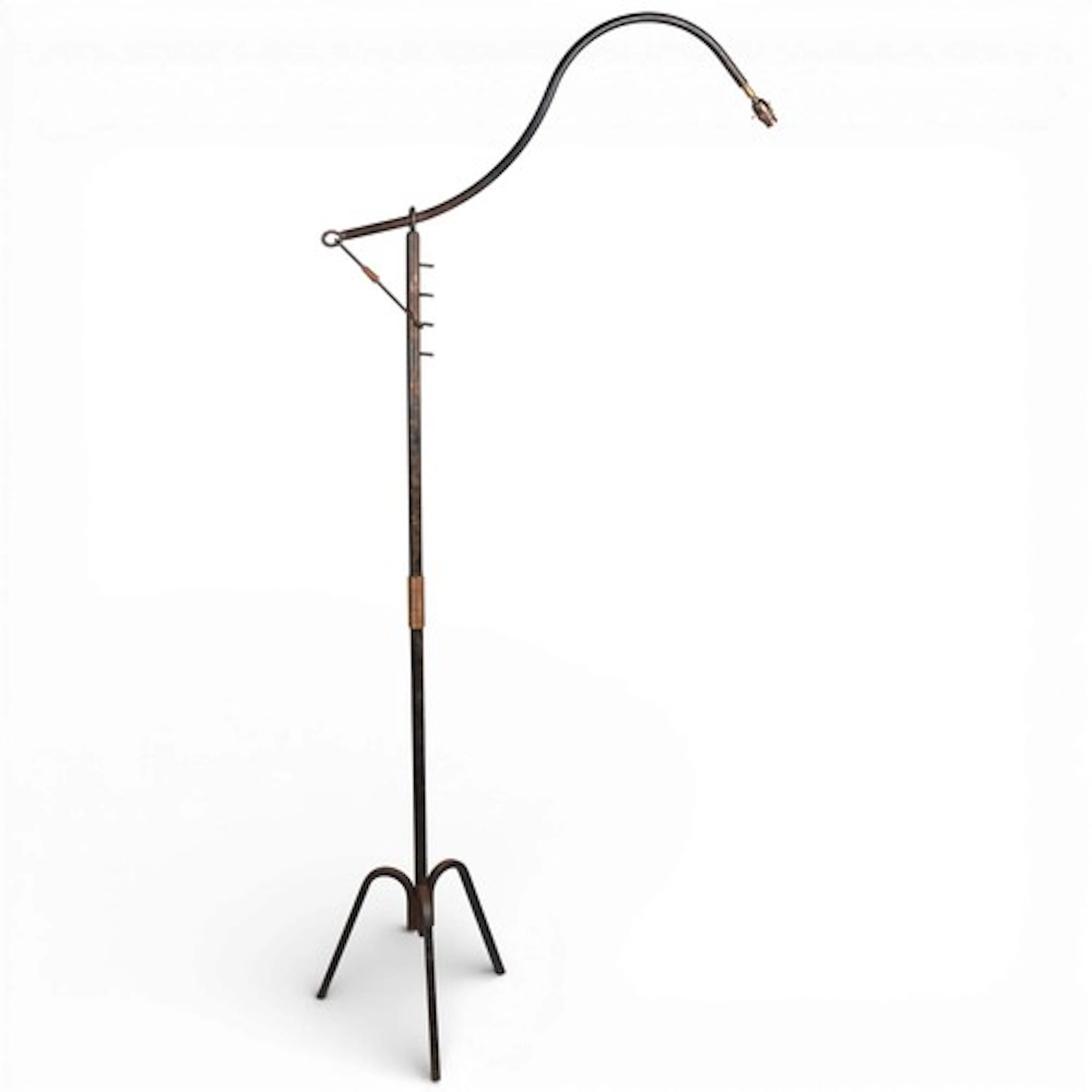 A vintage French blackened iron floor lamp with pivot arm an...