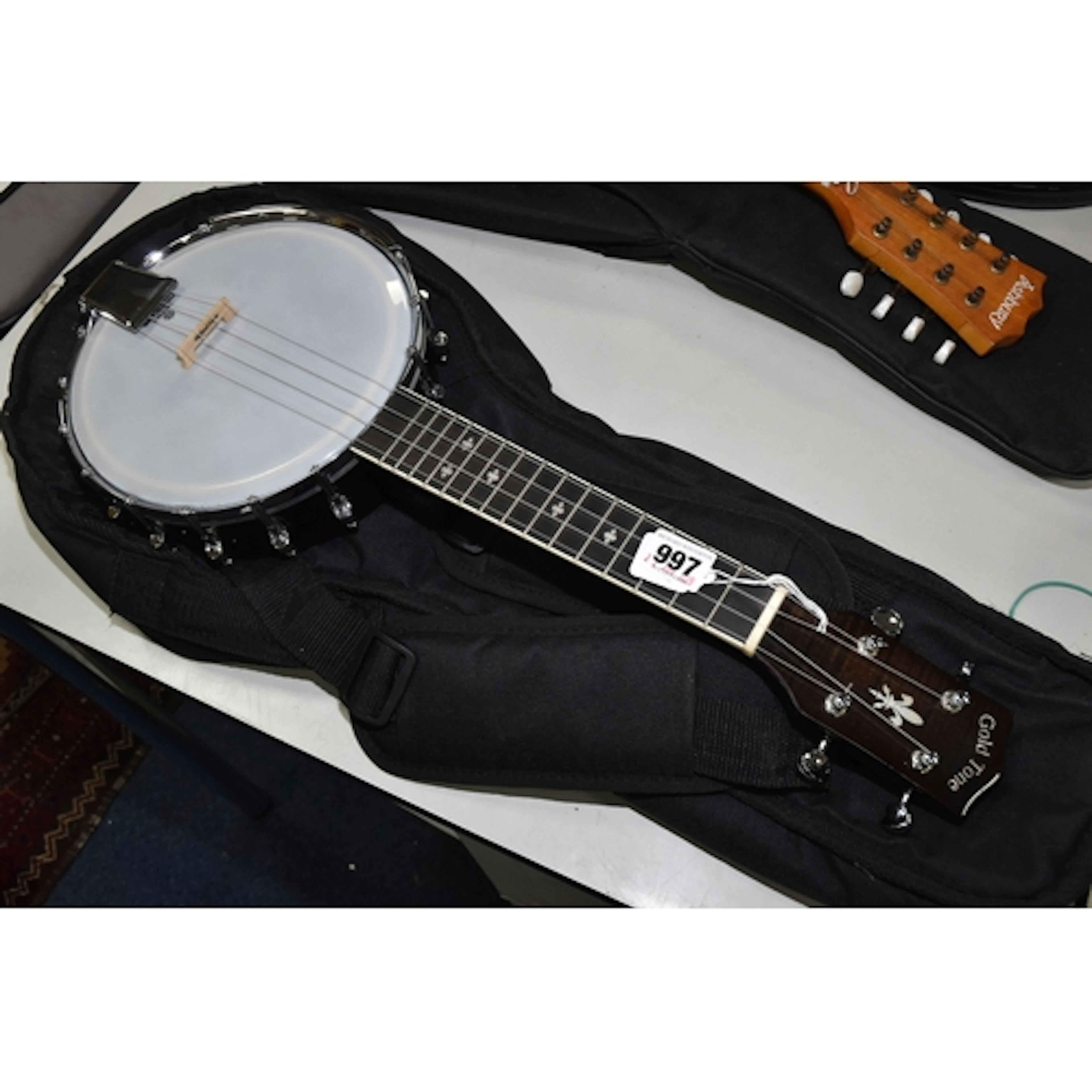 A GOLD TONE BANJOLELE CONCERT SCALE BANJO UKELELE, four stri...