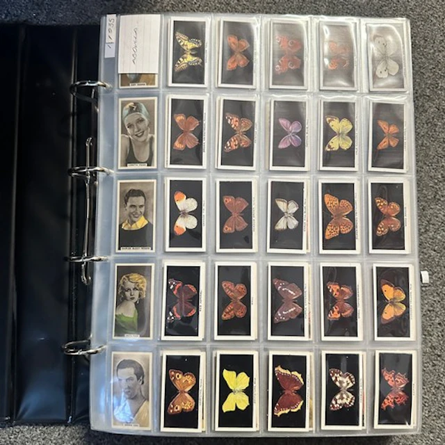 Cigarette cards, complete sets in a large album, in very goo...