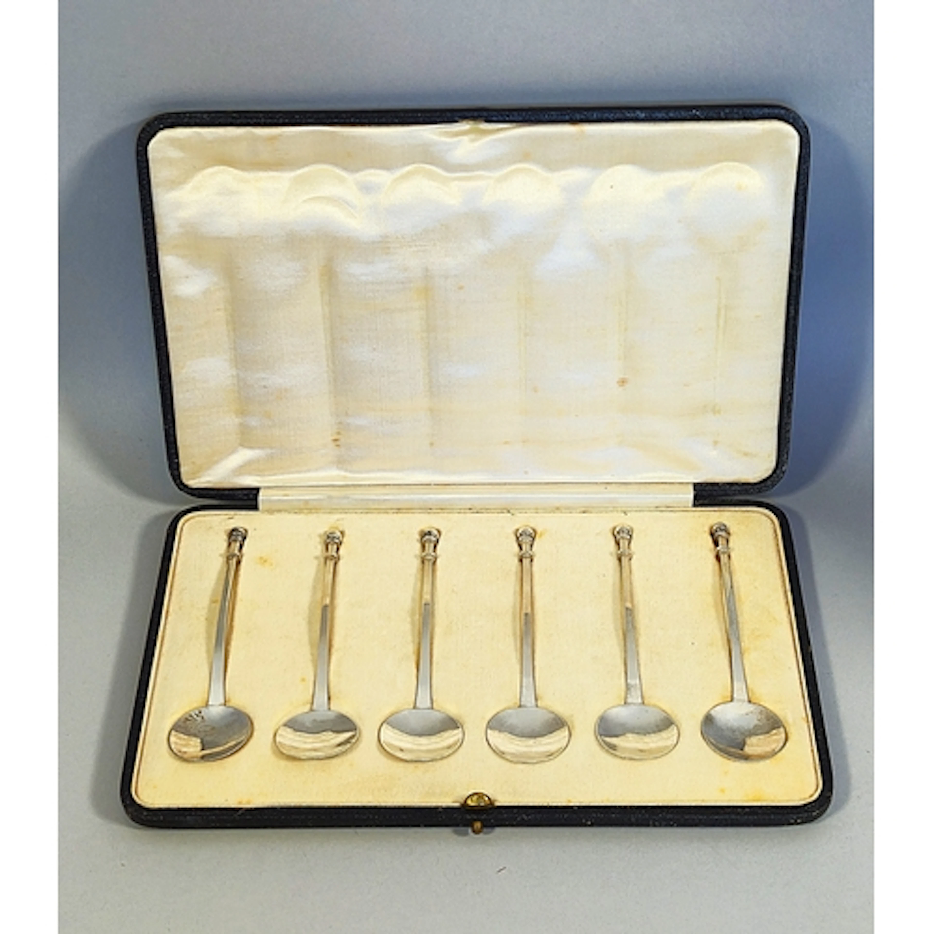 Set of six Arts & Crafts style hammered white metal teas...