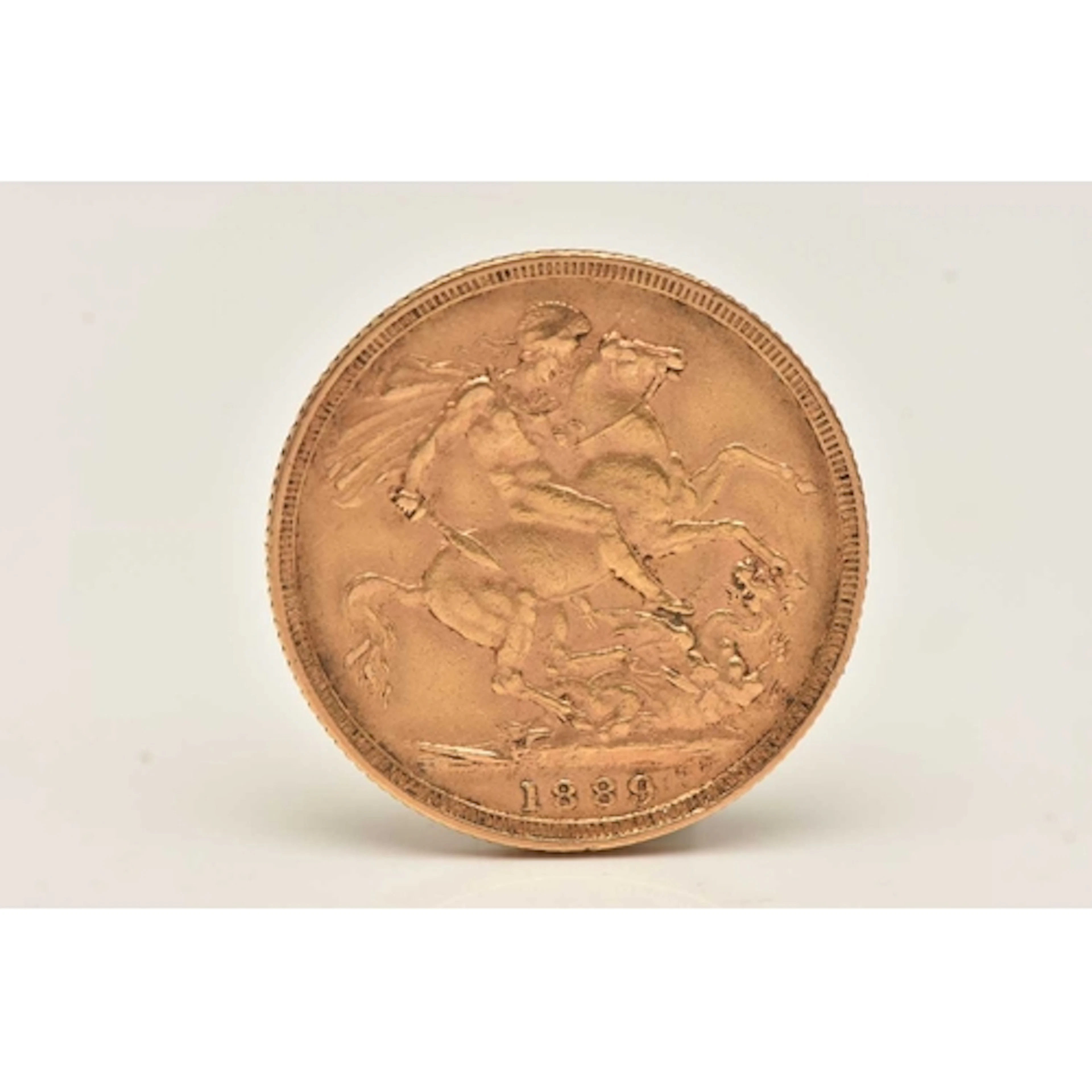 A VICTORIAN FULL GOLD SOVEREIGN, dated 1889, approximate dia...
