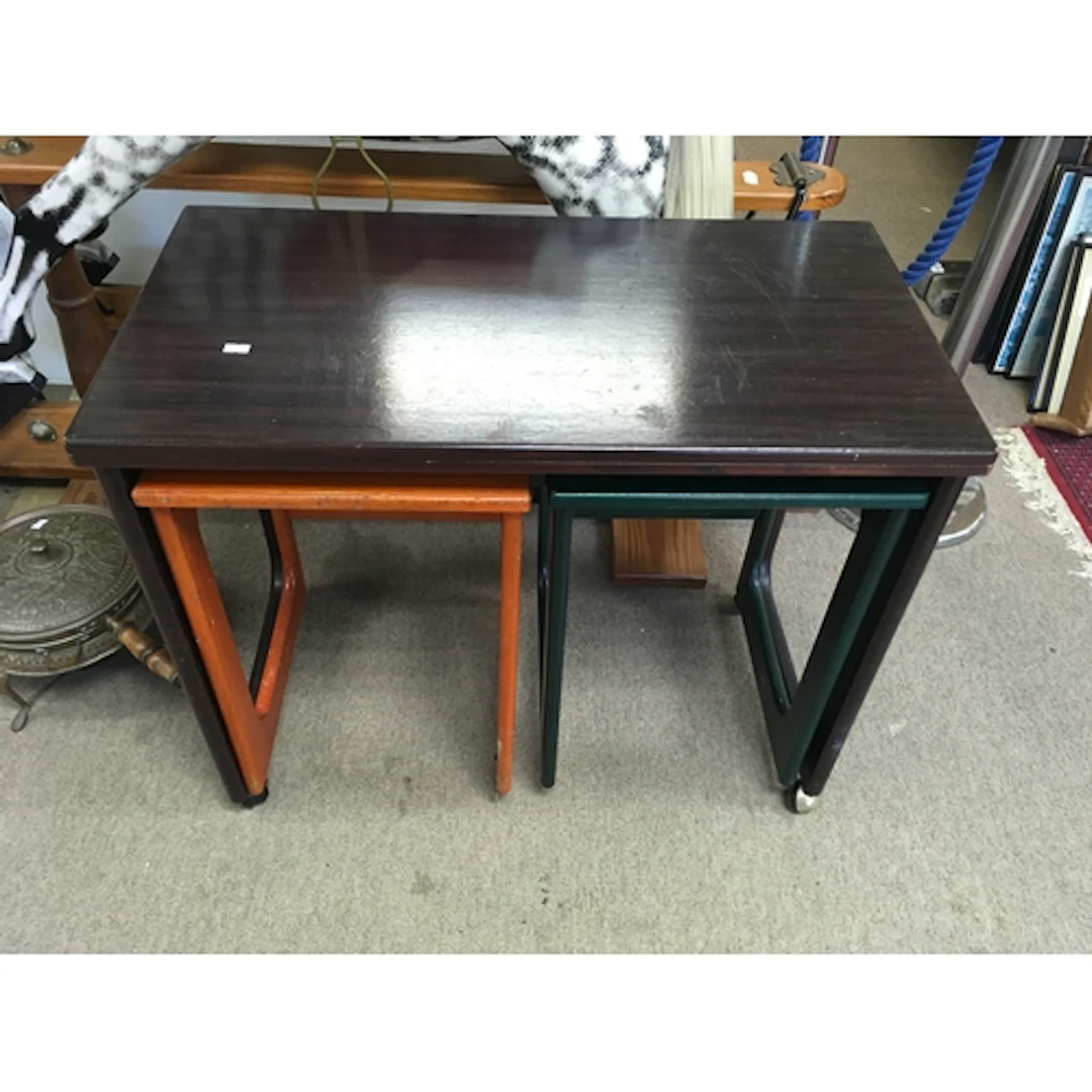 A nest of modern tables. largest being 66cm by 40cm...