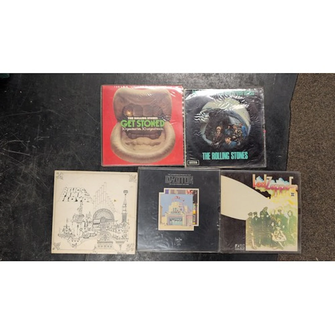 A group of rock LPs by the Rolling Stones, Led Zeppelin and ...