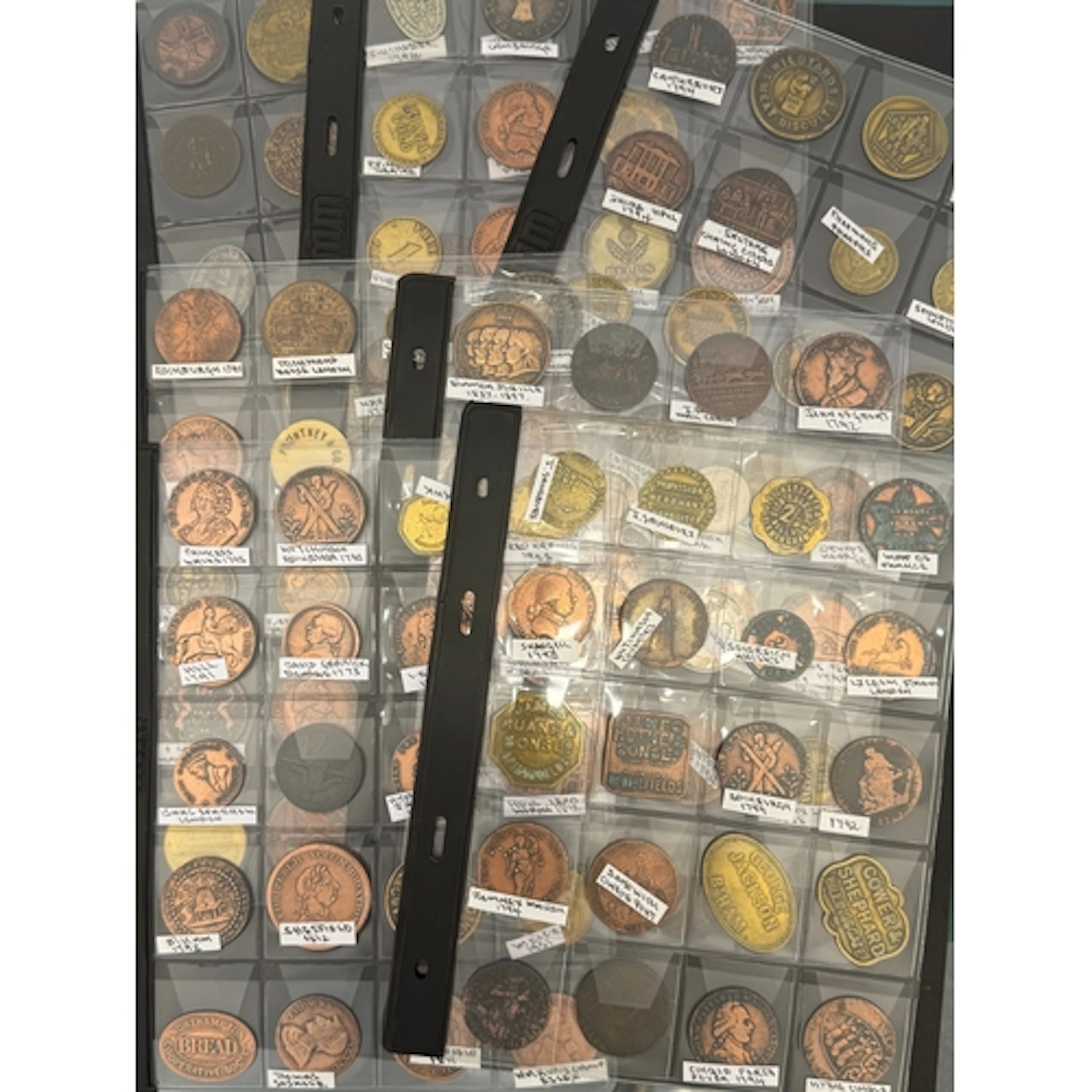 A collection of 75 mainly British tokens and medallions, dat...