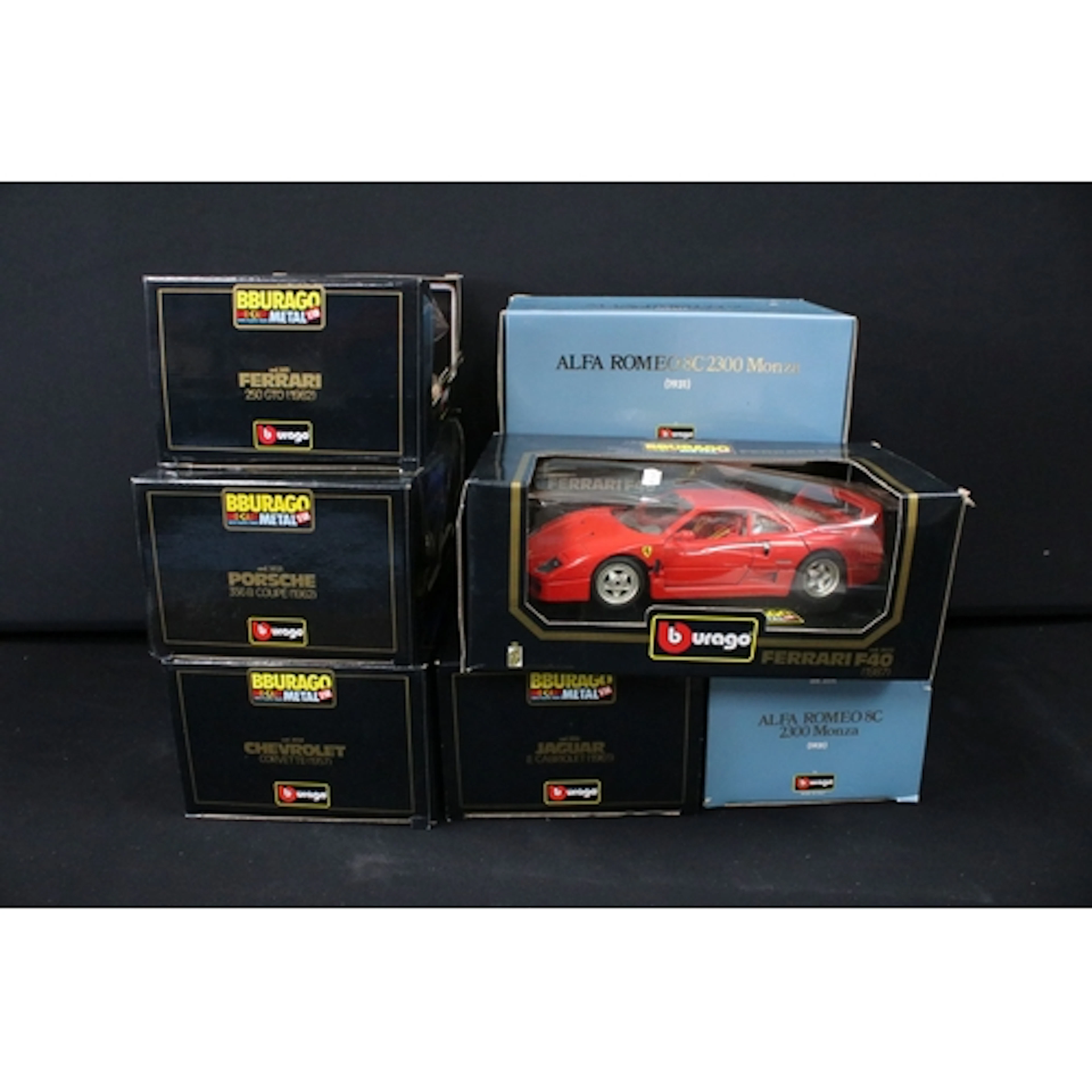Eight boxed 1/18 scale diecast models to include 2 x Burago ...