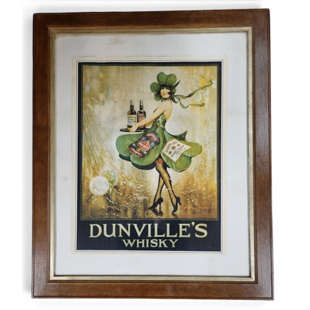 A large Dunville's whisky advertisement with a quality oak f...
