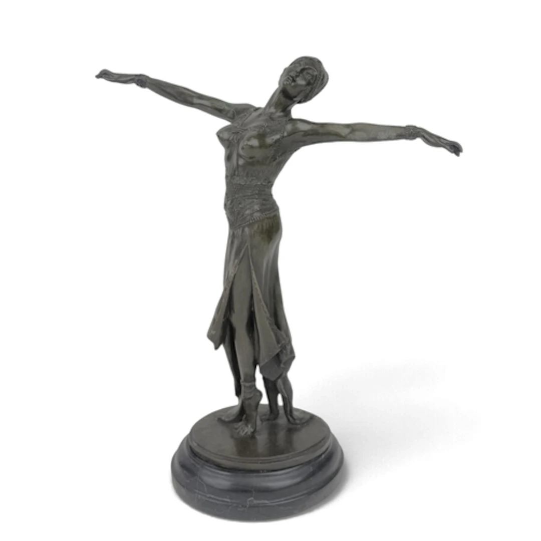 AN ART DECO SYLE BRONZE SCULPTURE OF A DANCER AFTER CHIPARUS...