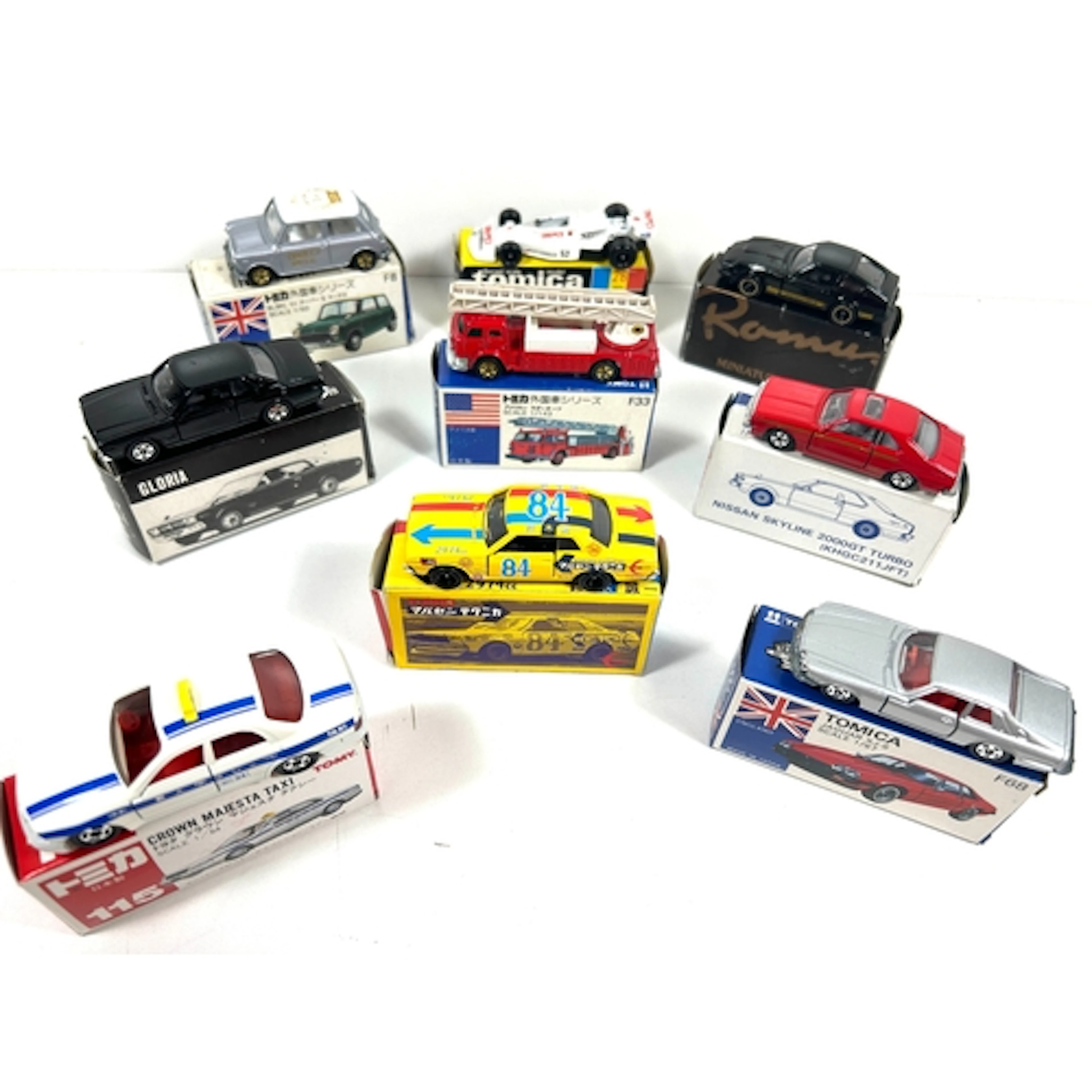 9 Tomica/Tomy various scales. Jaguar XJS, BLMC Mini Cooper "...